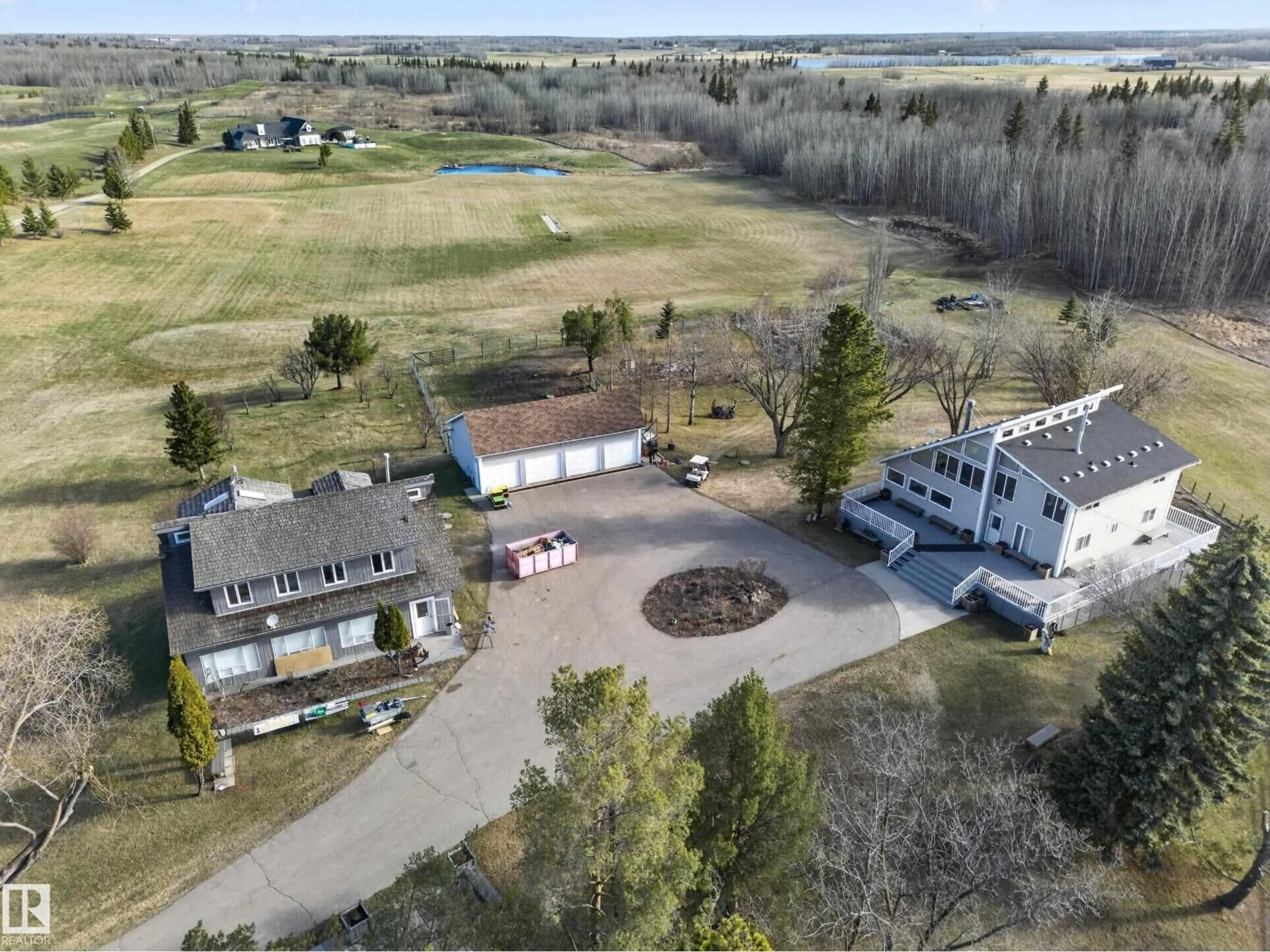 A pic from outside/outdoor area/front of a property/back of a property/a pic from drone, unknown for 22250 TWP ROAD 512, Rural Strathcona County Alberta T8C1H2