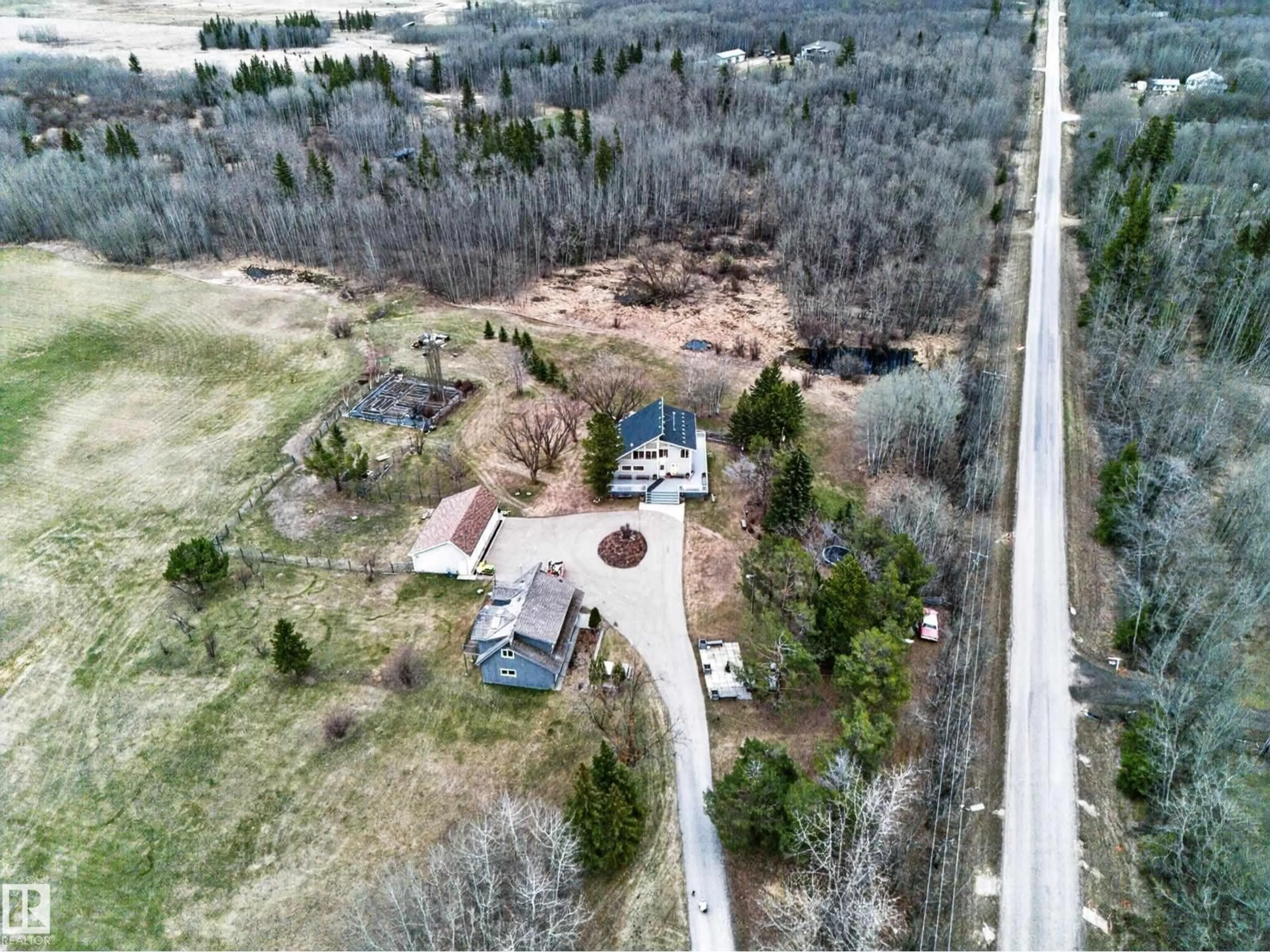 A pic from outside/outdoor area/front of a property/back of a property/a pic from drone, unknown for 22250 TWP ROAD 512, Rural Strathcona County Alberta T8C1H2