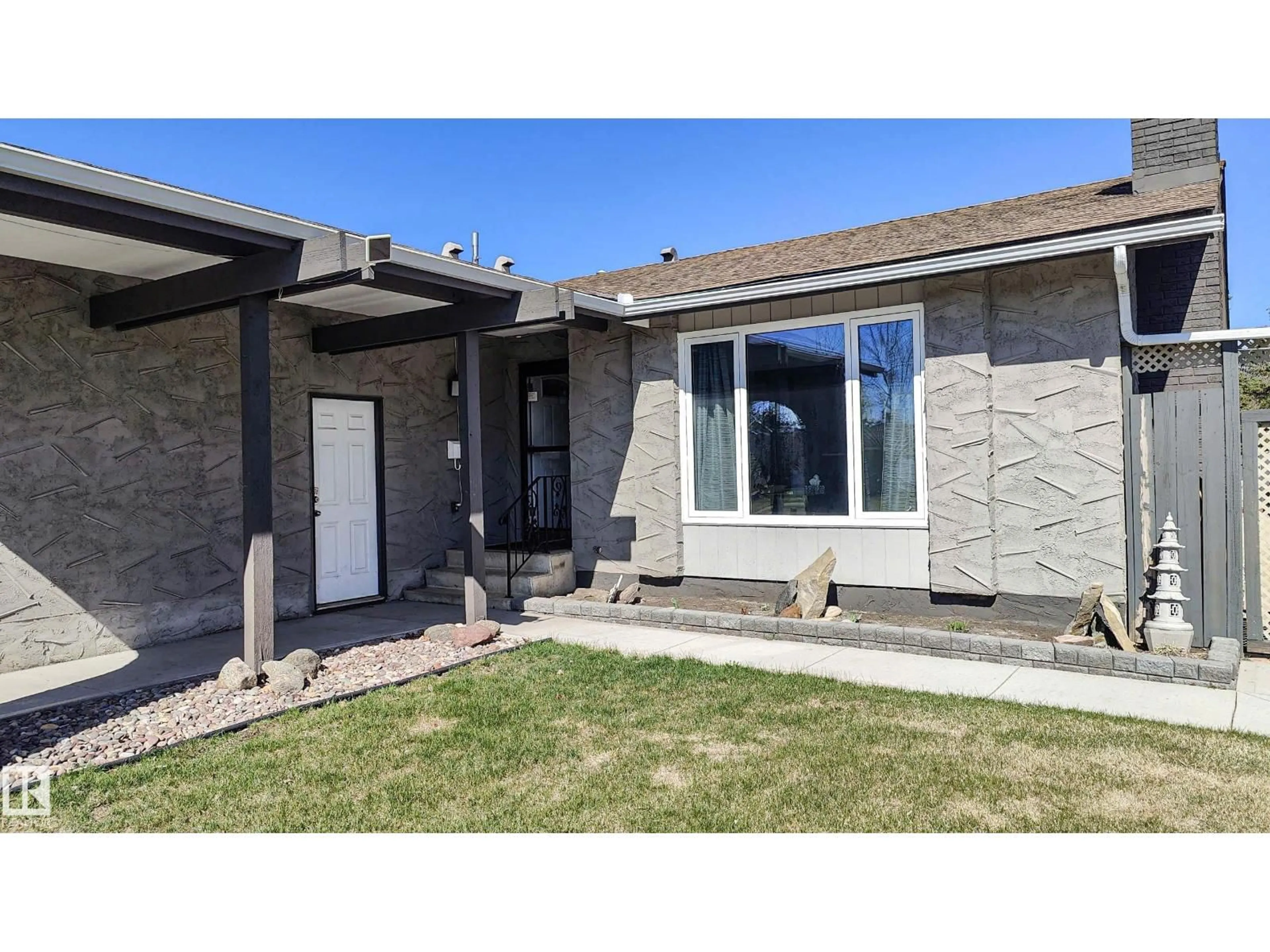 Home with vinyl exterior material, street for NW - 3311 108 ST, Edmonton Alberta T5J3C9