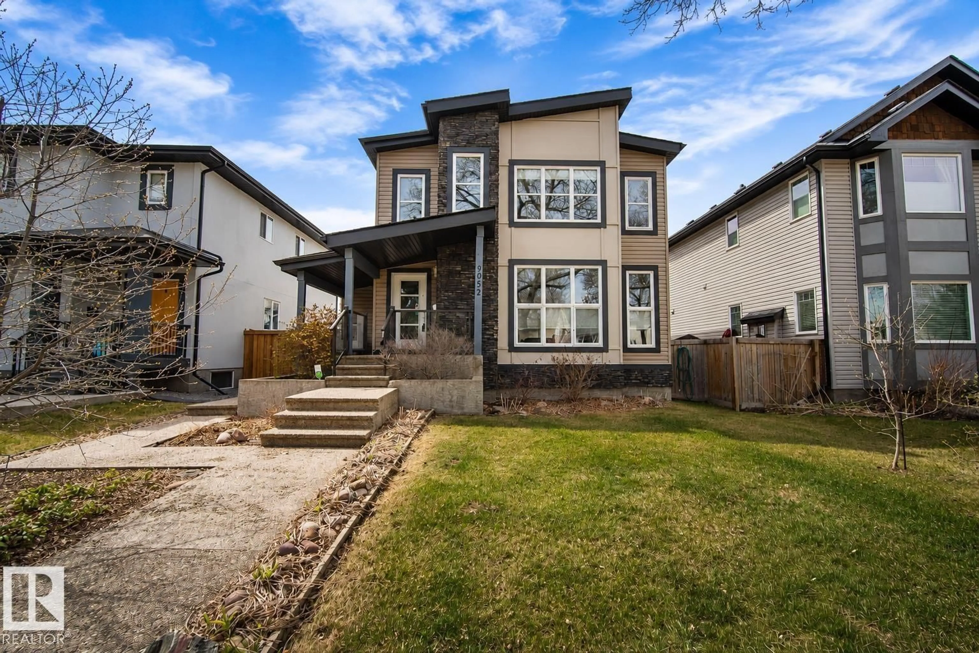 Home with brick exterior material, street for 9052 92 ST, Edmonton Alberta T6C3R2