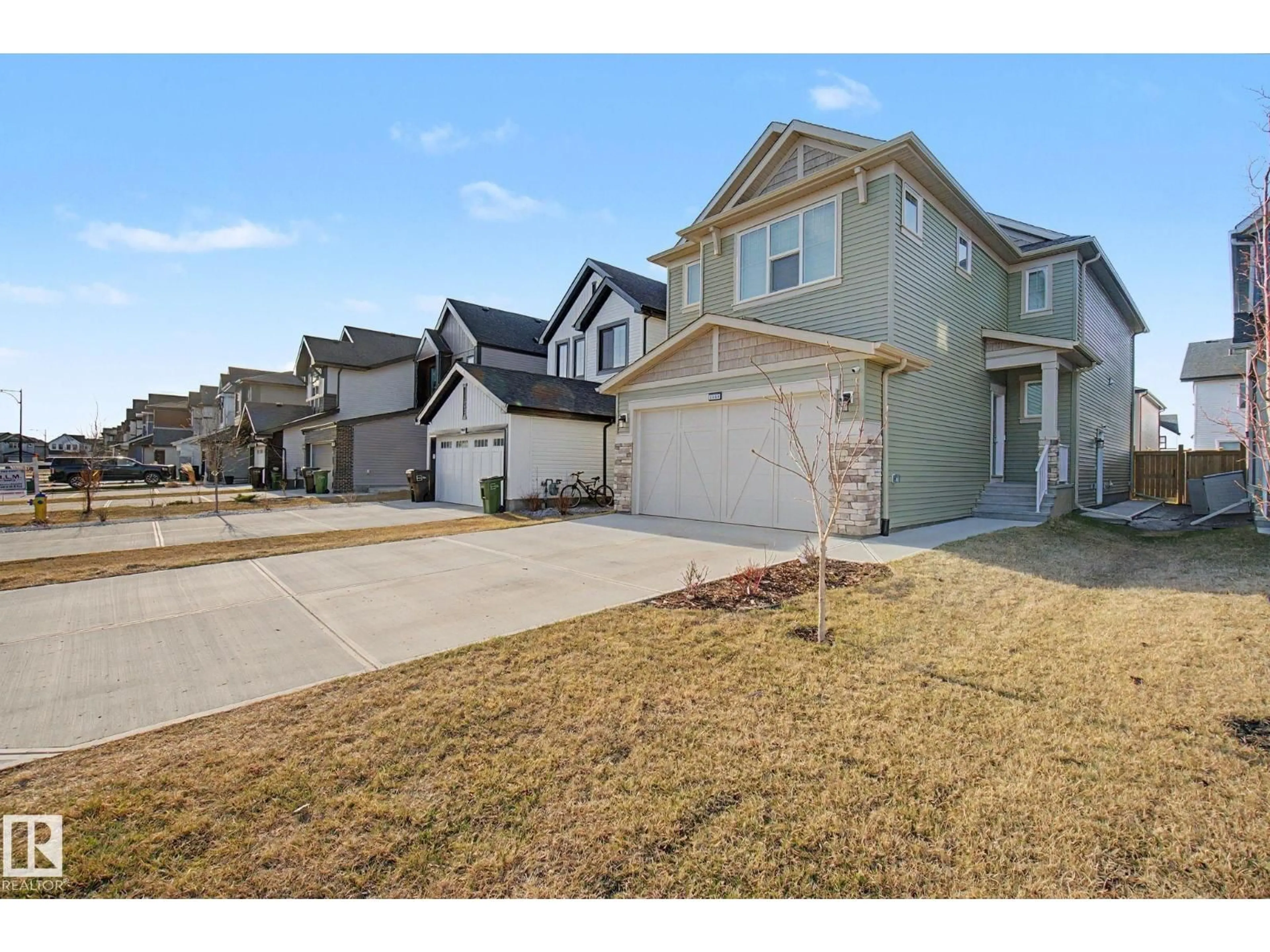 A pic from outside/outdoor area/front of a property/back of a property/a pic from drone, street for 3464 CRAIG LANDING LD, Edmonton Alberta T6W5H2