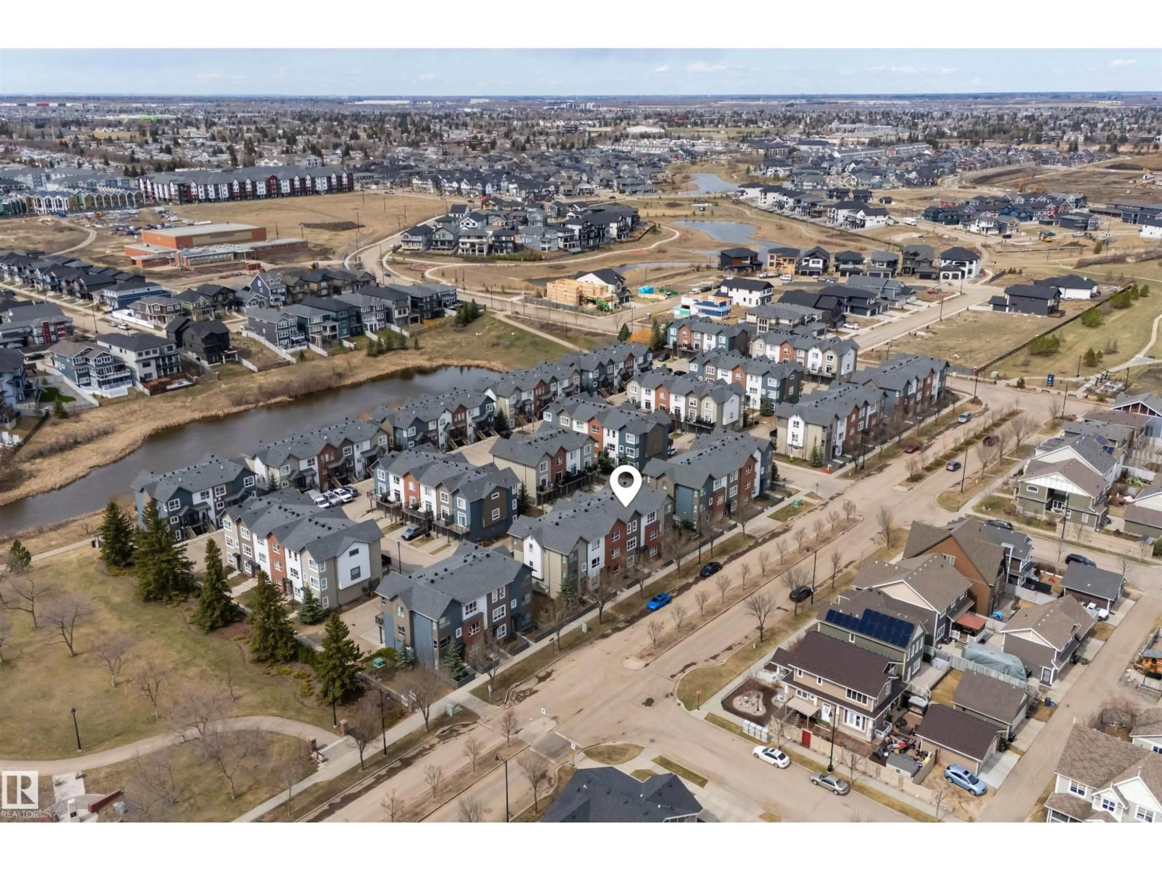 A pic from outside/outdoor area/front of a property/back of a property/a pic from drone, street for 8 - 2560 PEGASUS BV, Edmonton Alberta T5E6V4