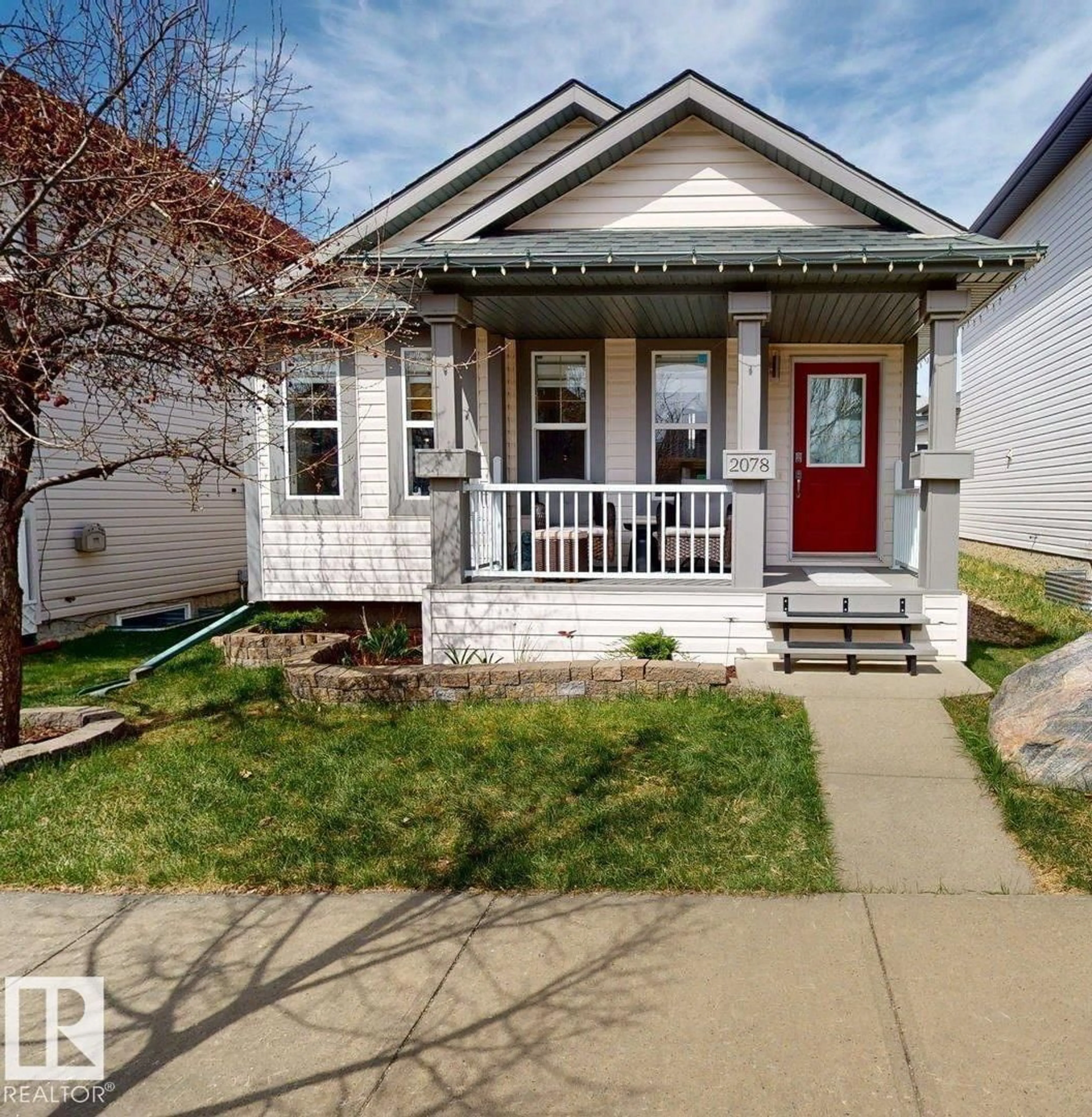 Home with vinyl exterior material, street for 2078 TANNER WD, Edmonton Alberta T6R2S4