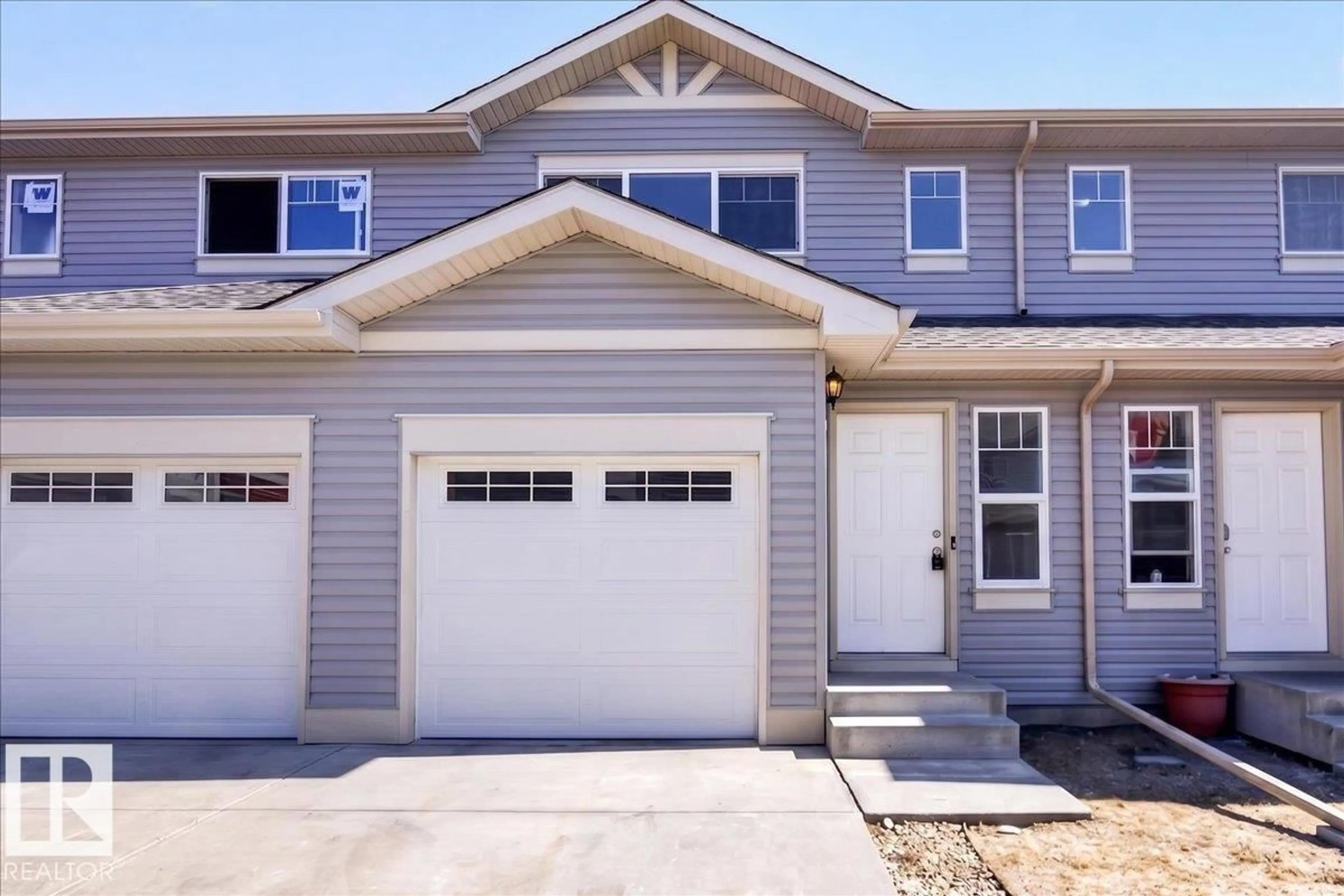 Home with vinyl exterior material, street for #7 - 18004 89 ST NW, Edmonton Alberta T5Z0E7