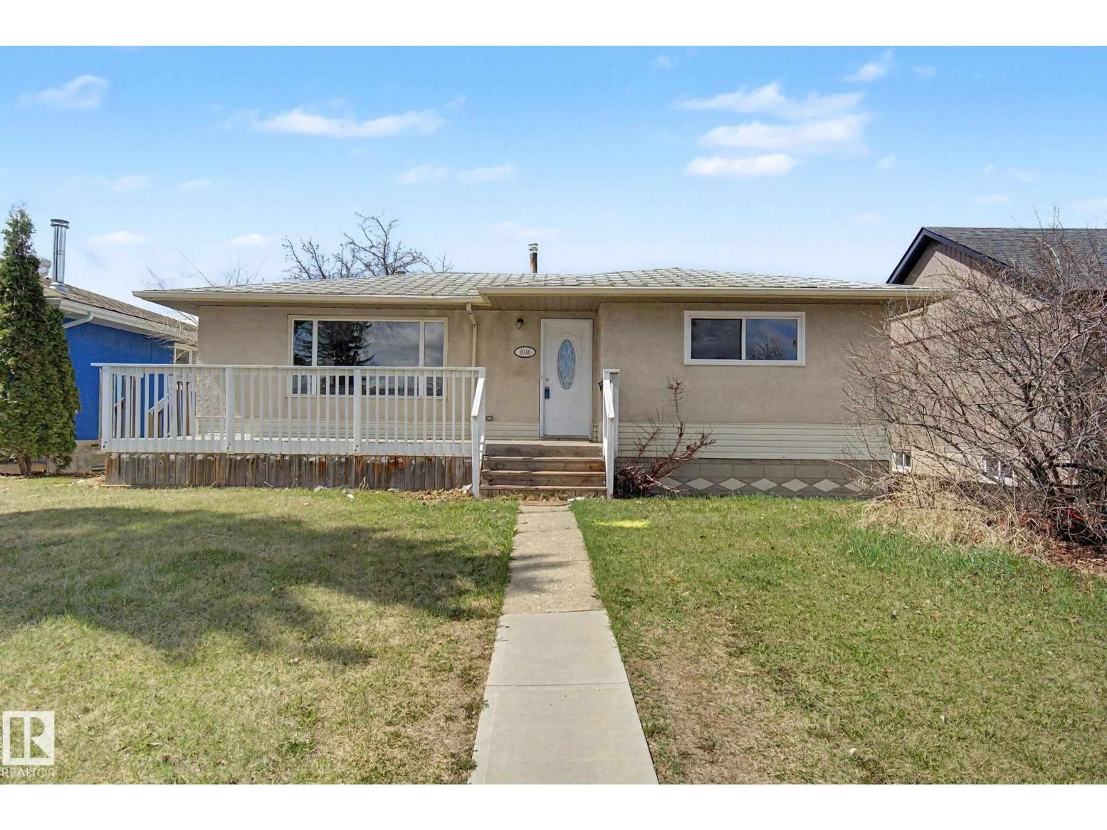 Home with vinyl exterior material, street for NW - 6048 105B ST, Edmonton Alberta T6H2S5