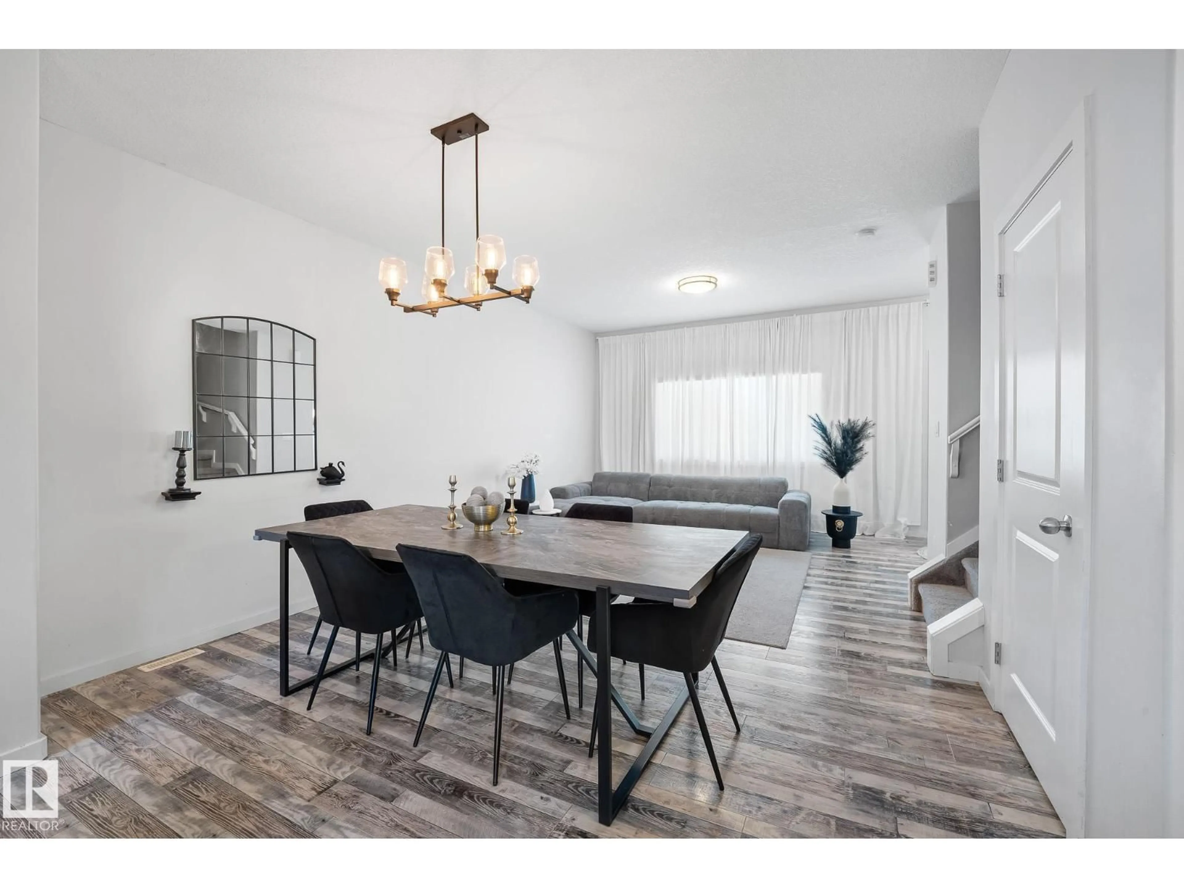 Dining room, wood/laminate floor for 911 MORRIS WY, Leduc Alberta T9E1E9