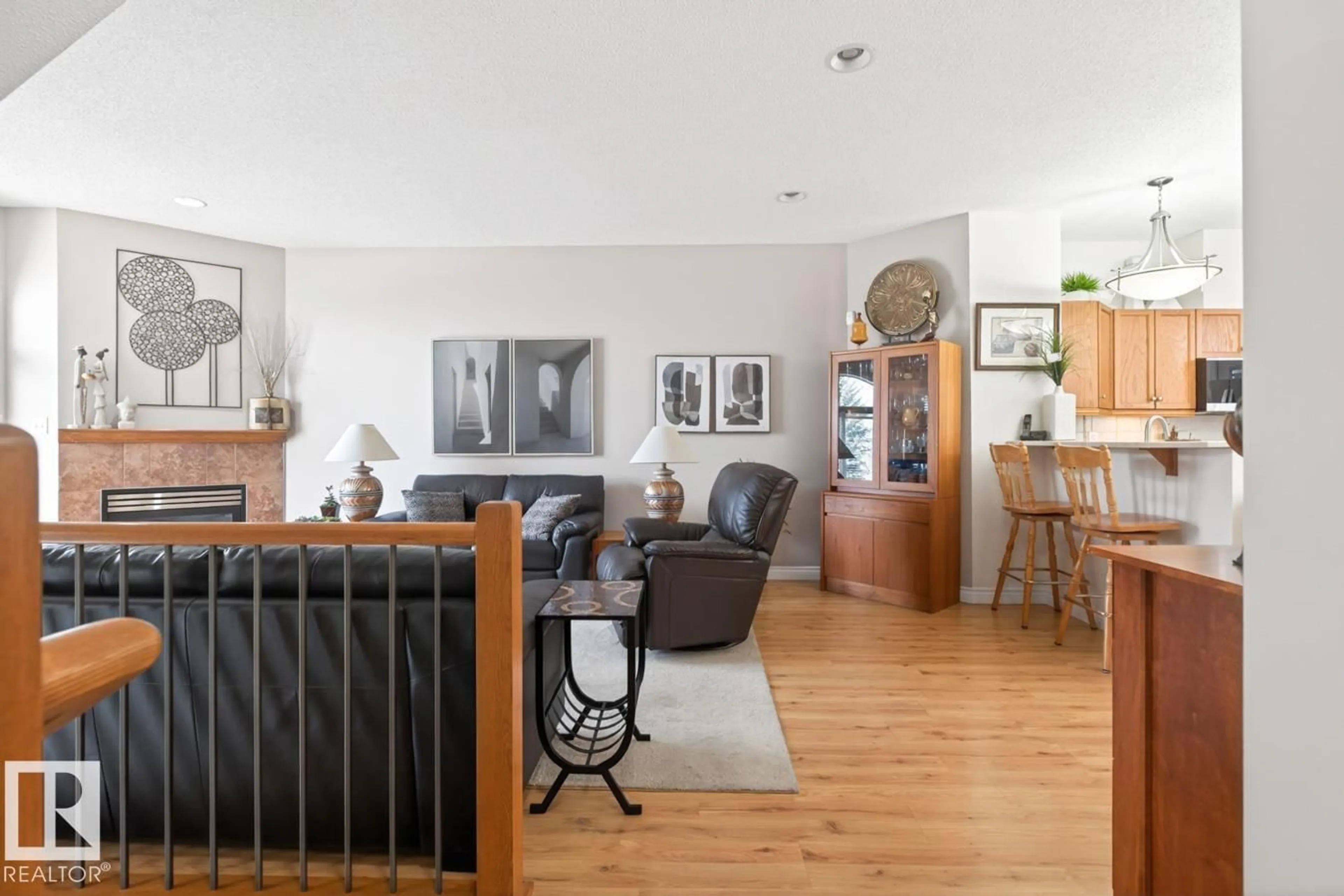 Living room with furniture, wood/laminate floor for #23 - 101 JIM COMMON DR, Sherwood Park Alberta T8M2M1