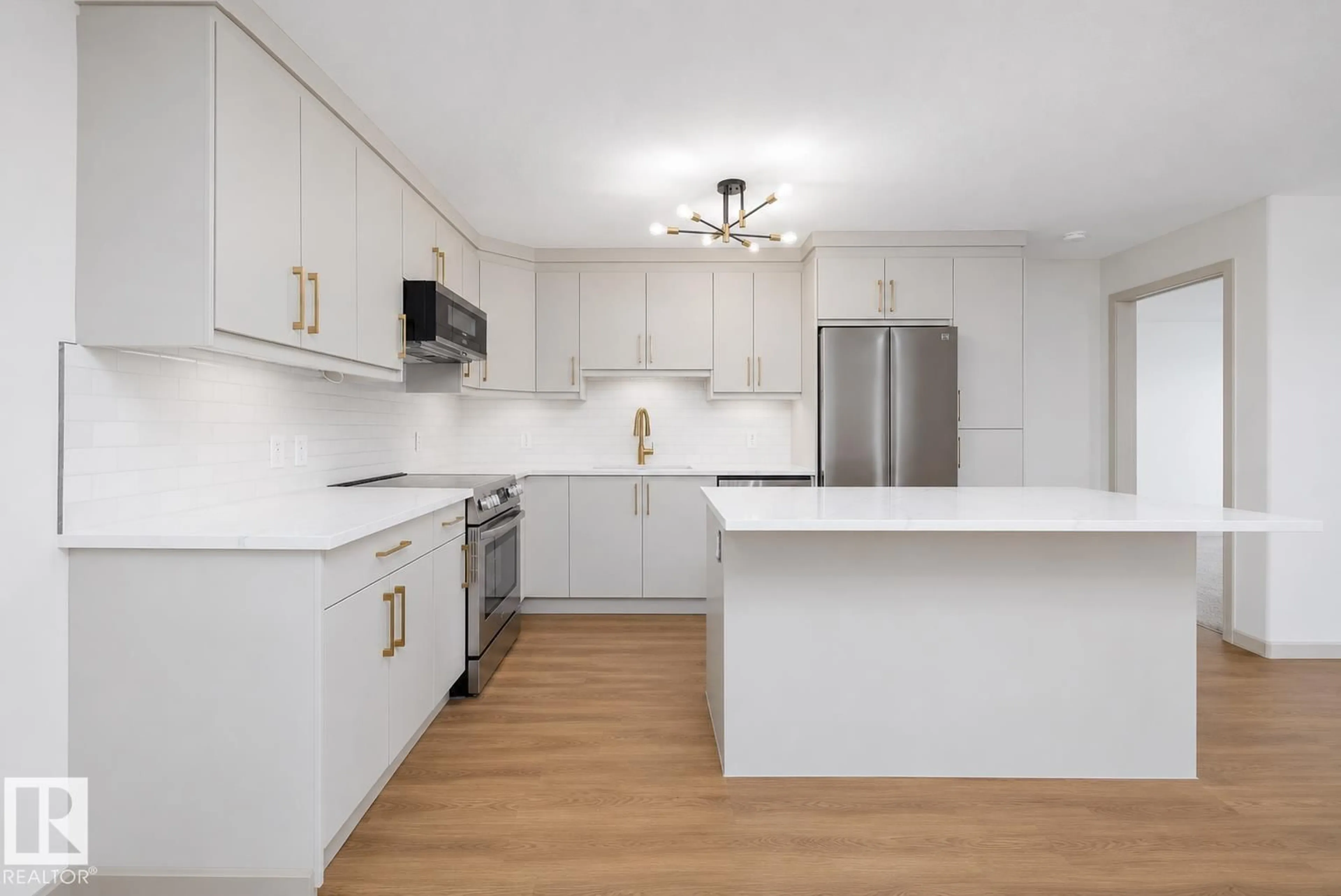 Open concept kitchen, wood/laminate floor for 2096 - 353 BLACKMUD CREEK DRIVE, Edmonton Alberta T6W0G1