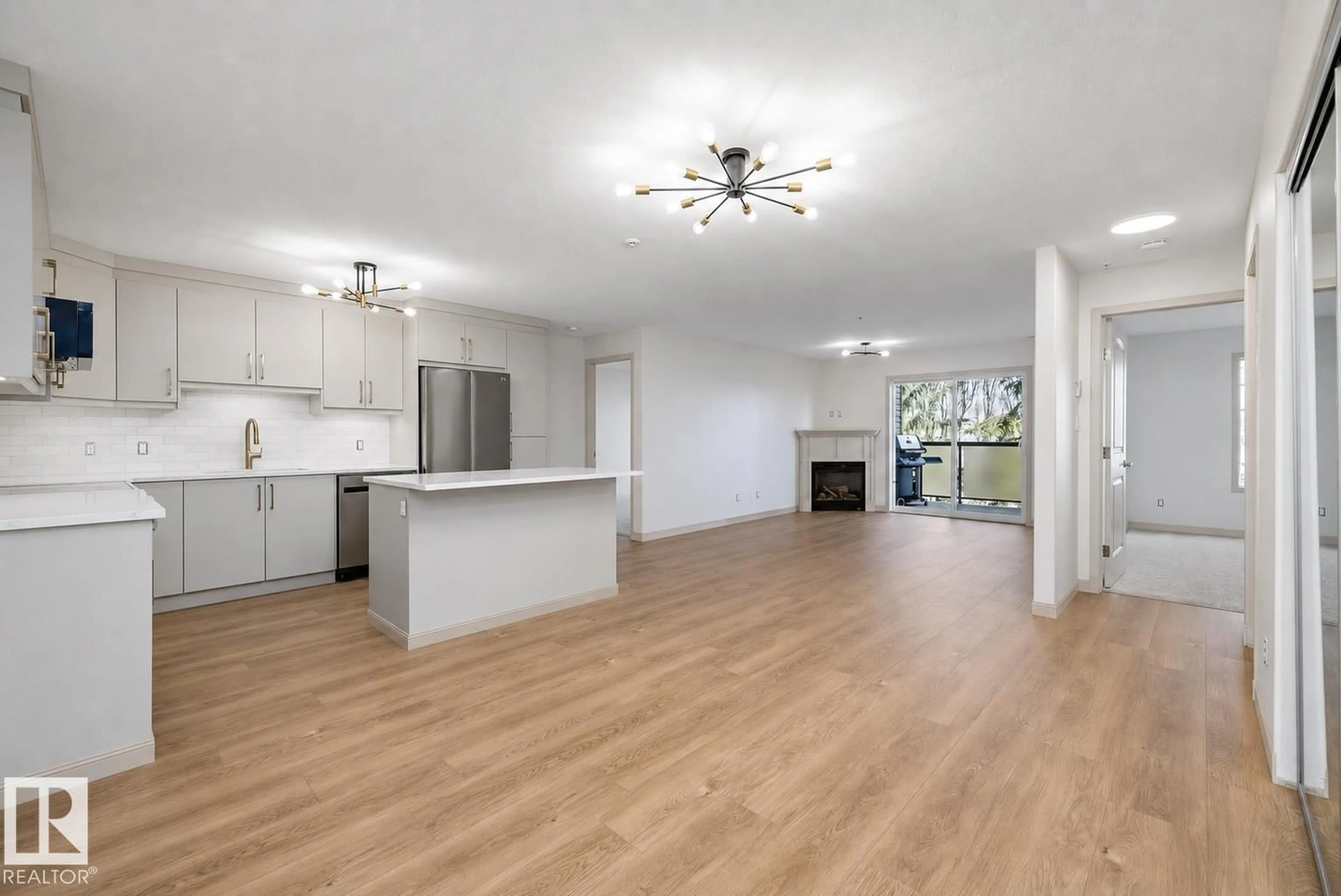 Open concept kitchen, wood/laminate floor for 2096 - 353 BLACKMUD CREEK DRIVE, Edmonton Alberta T6W0G1