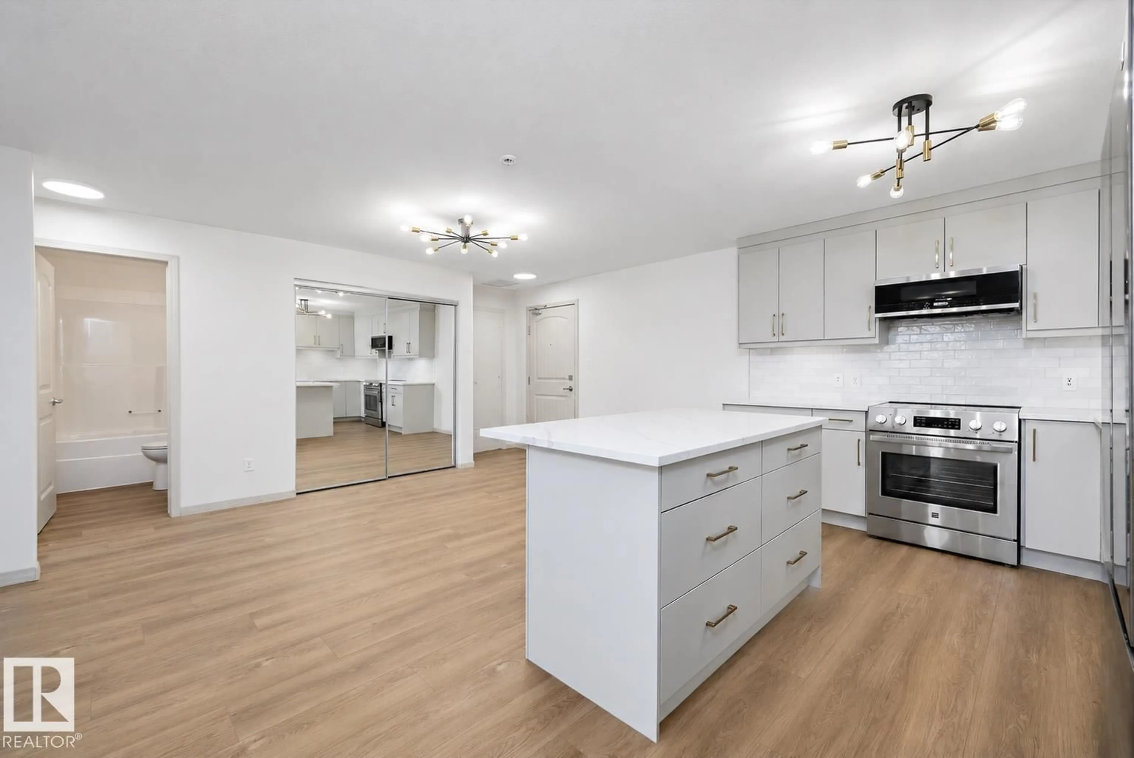 Open concept kitchen, wood/laminate floor for 2096 - 353 BLACKMUD CREEK DRIVE, Edmonton Alberta T6W0G1