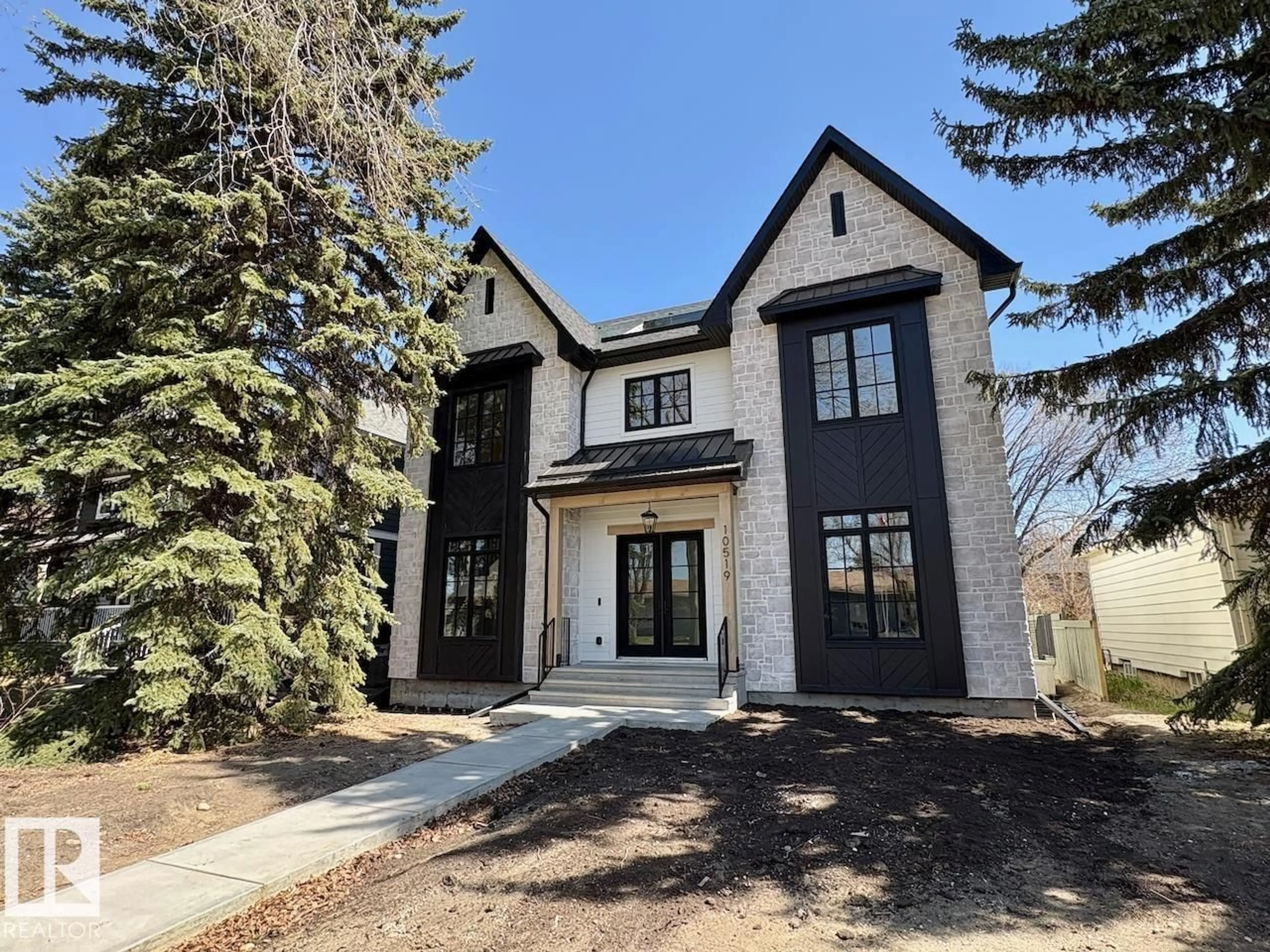 Home with brick exterior material, street for NW - 10519 138 ST, Edmonton Alberta T5N2J5