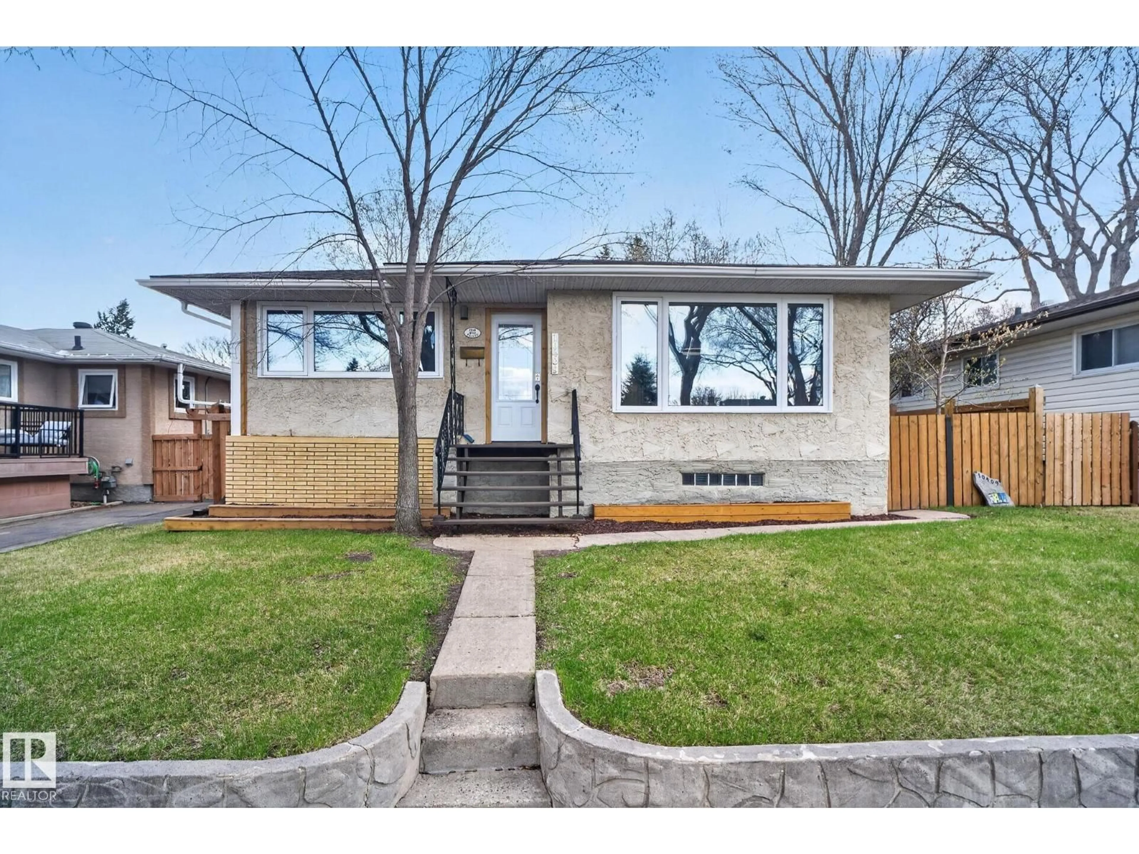 Home with brick exterior material, street for 10409 83 ST, Edmonton Alberta T6A3P2