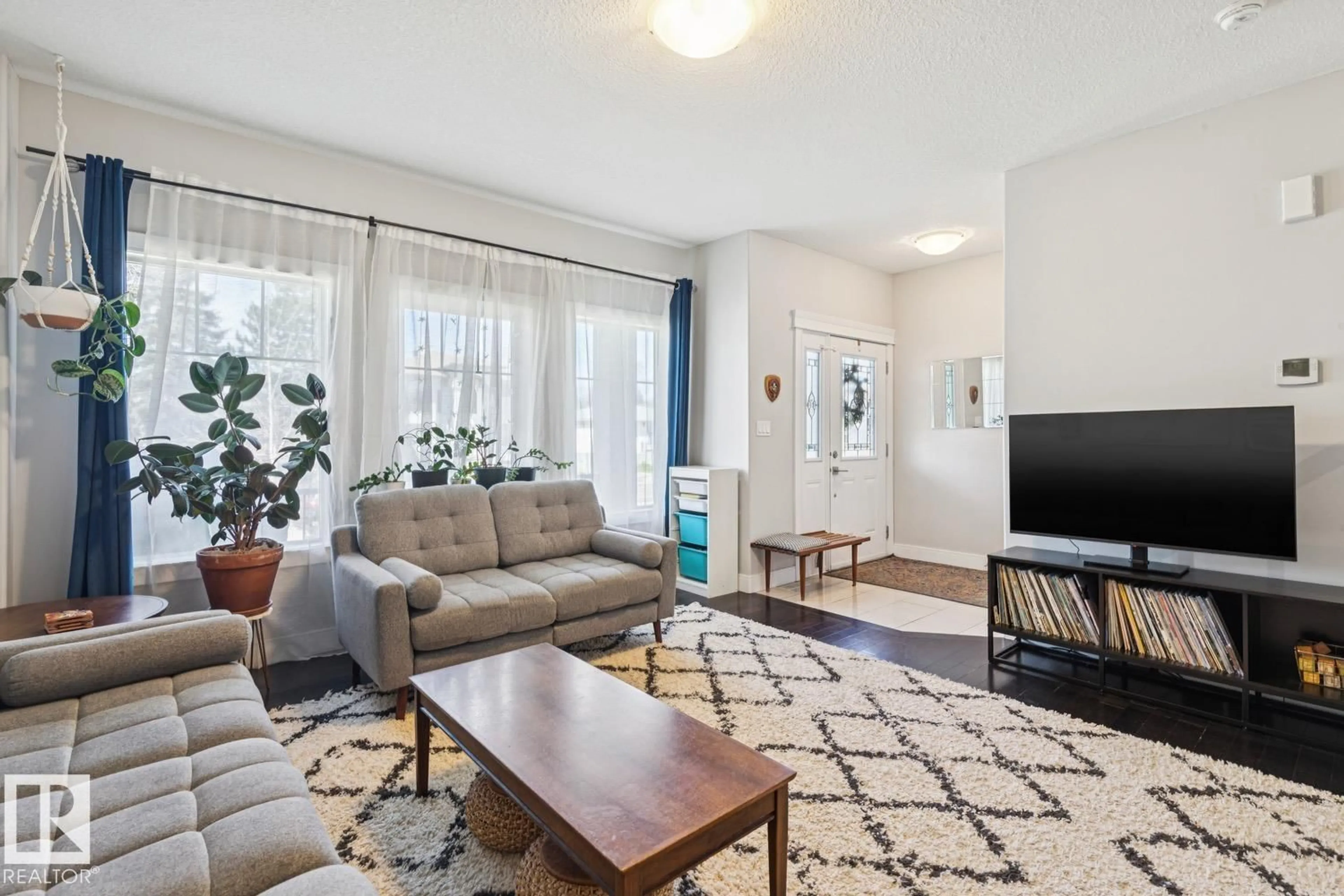 Living room with furniture, unknown for NW - 9919 79 ST, Edmonton Alberta T6A3G2