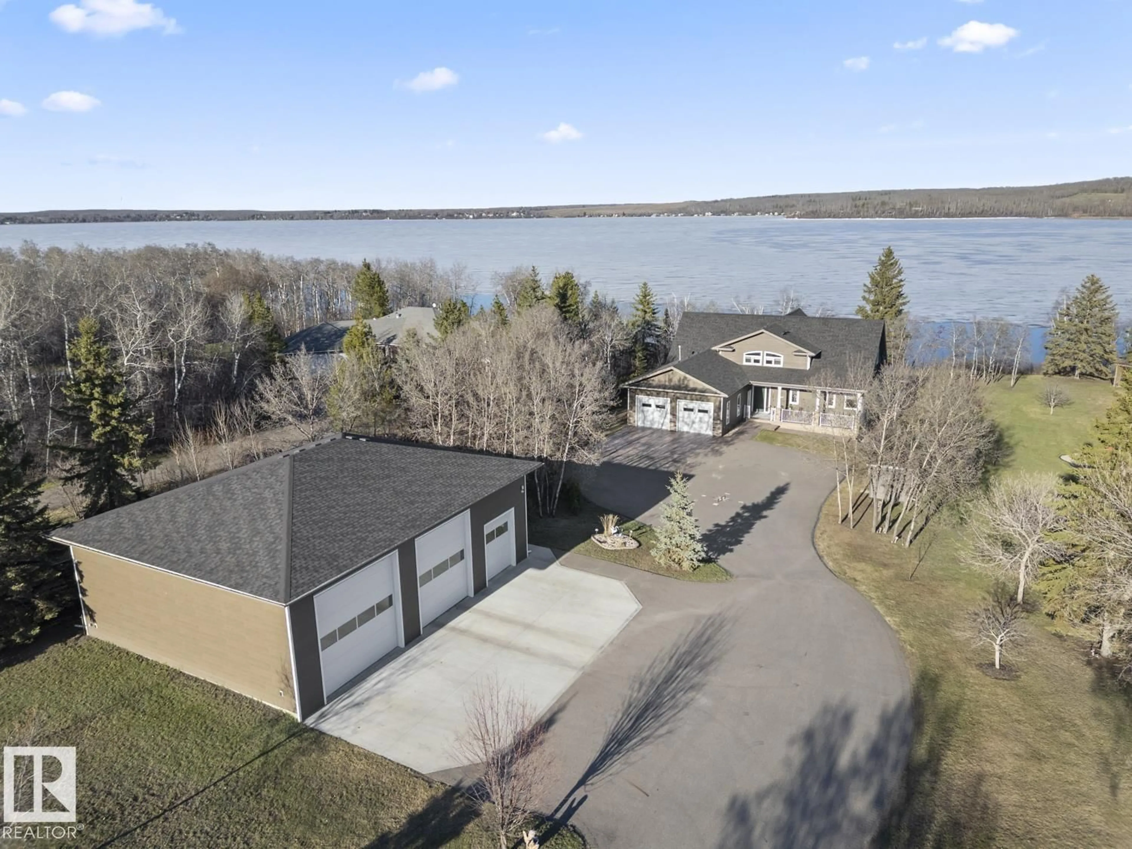 A pic from outside/outdoor area/front of a property/back of a property/a pic from drone, water/lake/river/ocean view for #4 - 46526 TWP RD 604 A, Rural Bonnyville M.D. Alberta T9N2J6