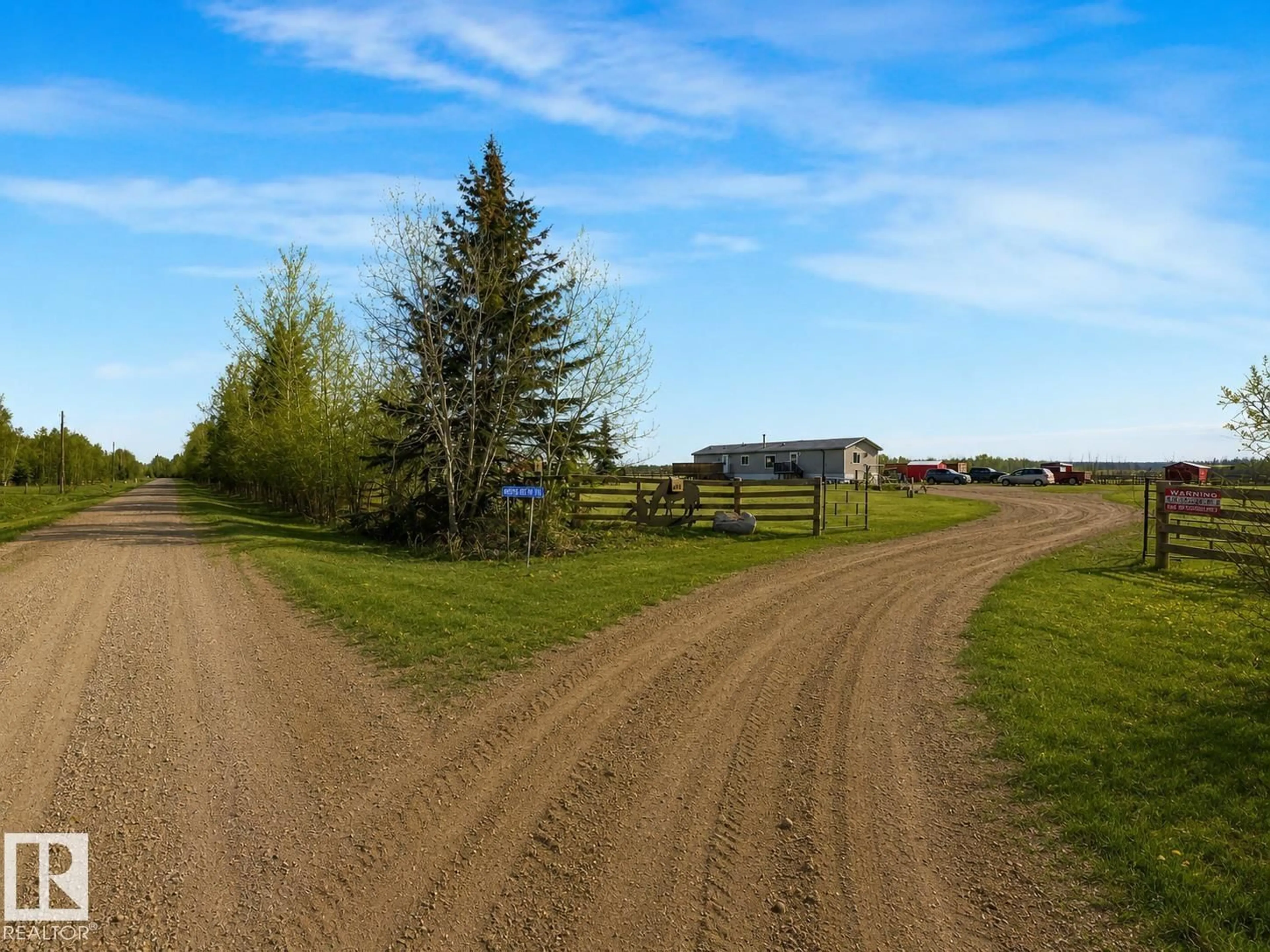 A pic from outside/outdoor area/front of a property/back of a property/a pic from drone, street for 56003 RGE ROAD 20A, Rural Lac Ste. Anne County Alberta T0E1V0