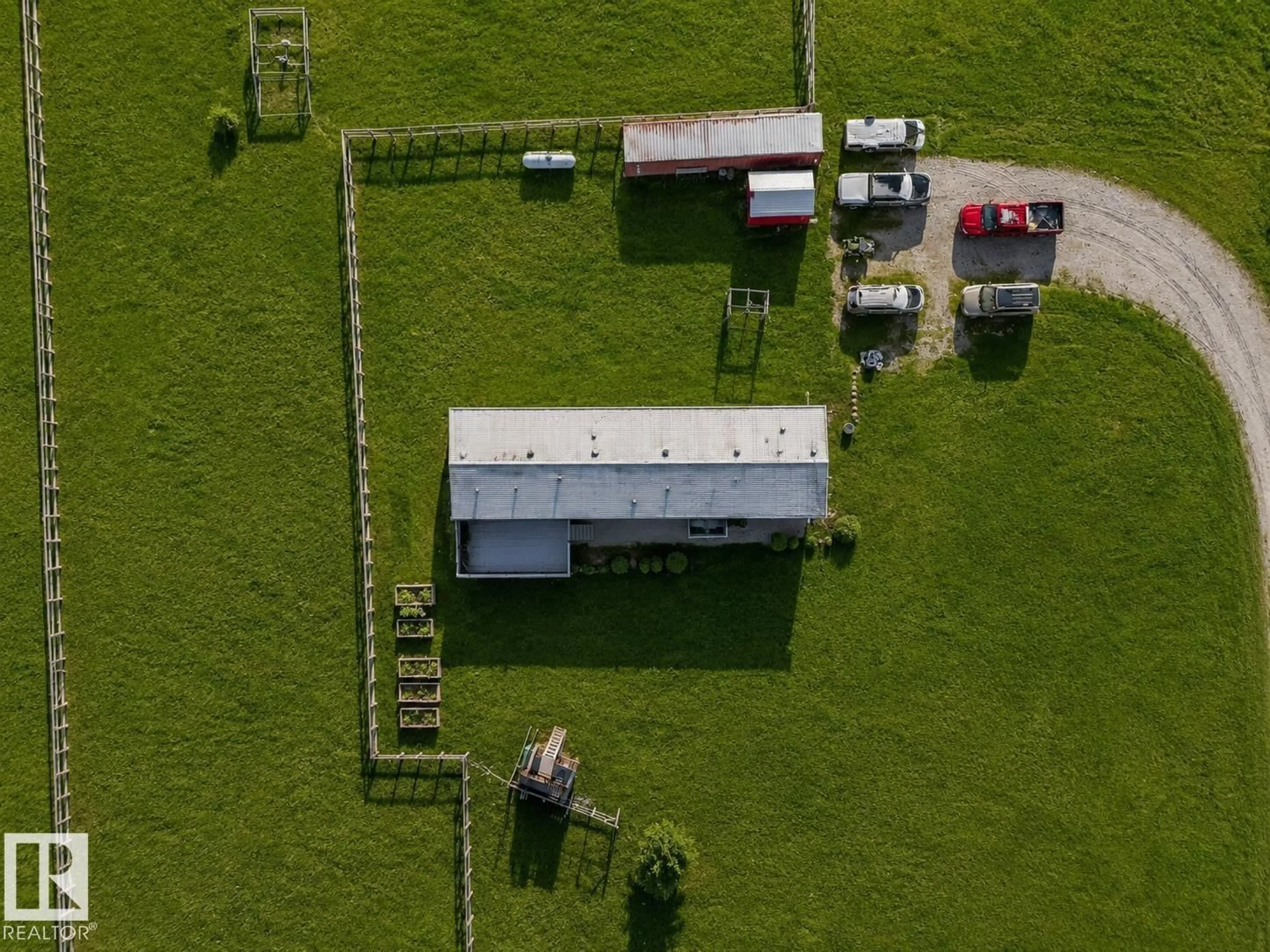 A pic from outside/outdoor area/front of a property/back of a property/a pic from drone, building for 56003 RGE ROAD 20A, Rural Lac Ste. Anne County Alberta T0E1V0