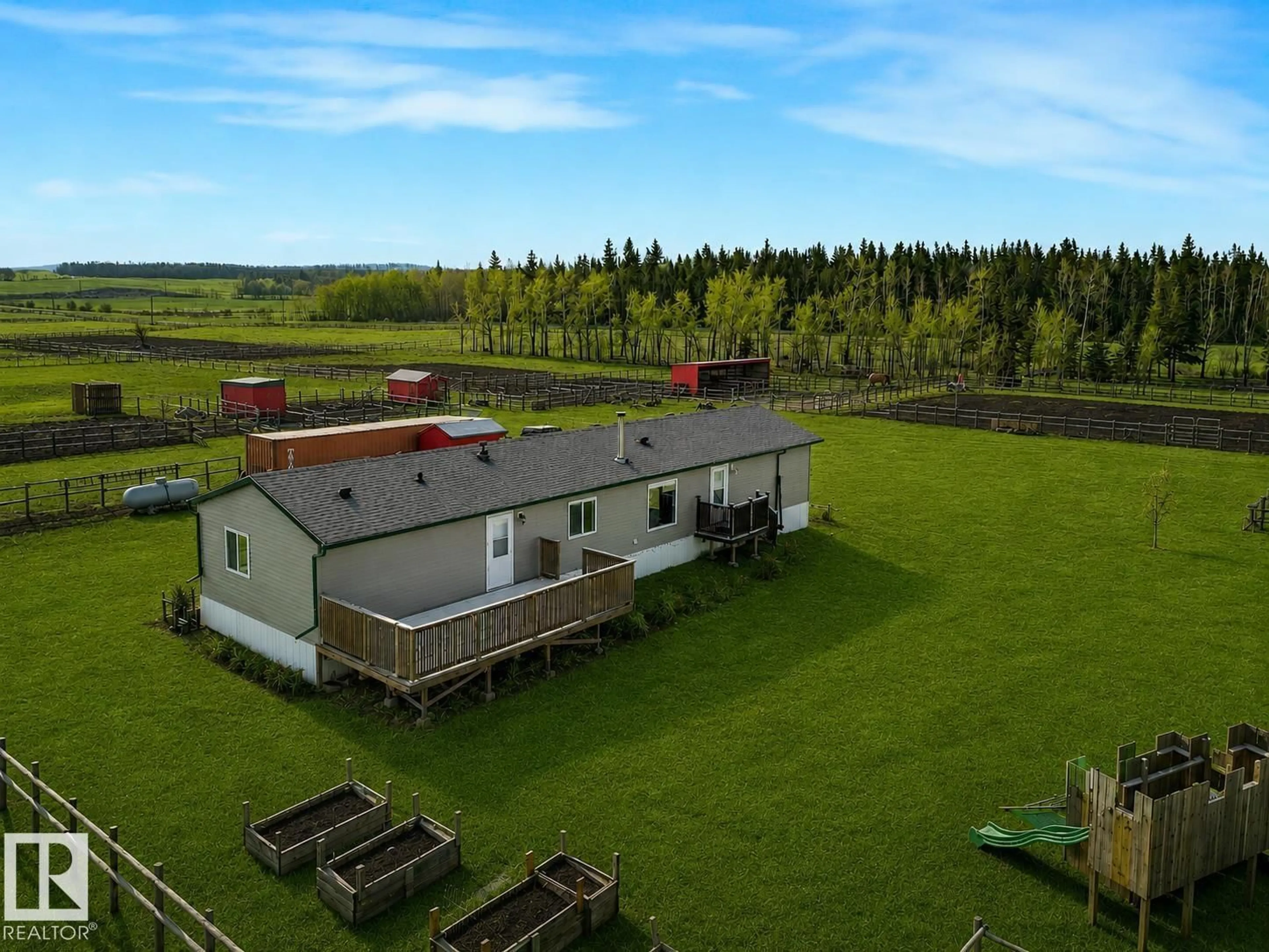 A pic from outside/outdoor area/front of a property/back of a property/a pic from drone, building for 56003 RGE ROAD 20A, Rural Lac Ste. Anne County Alberta T0E1V0
