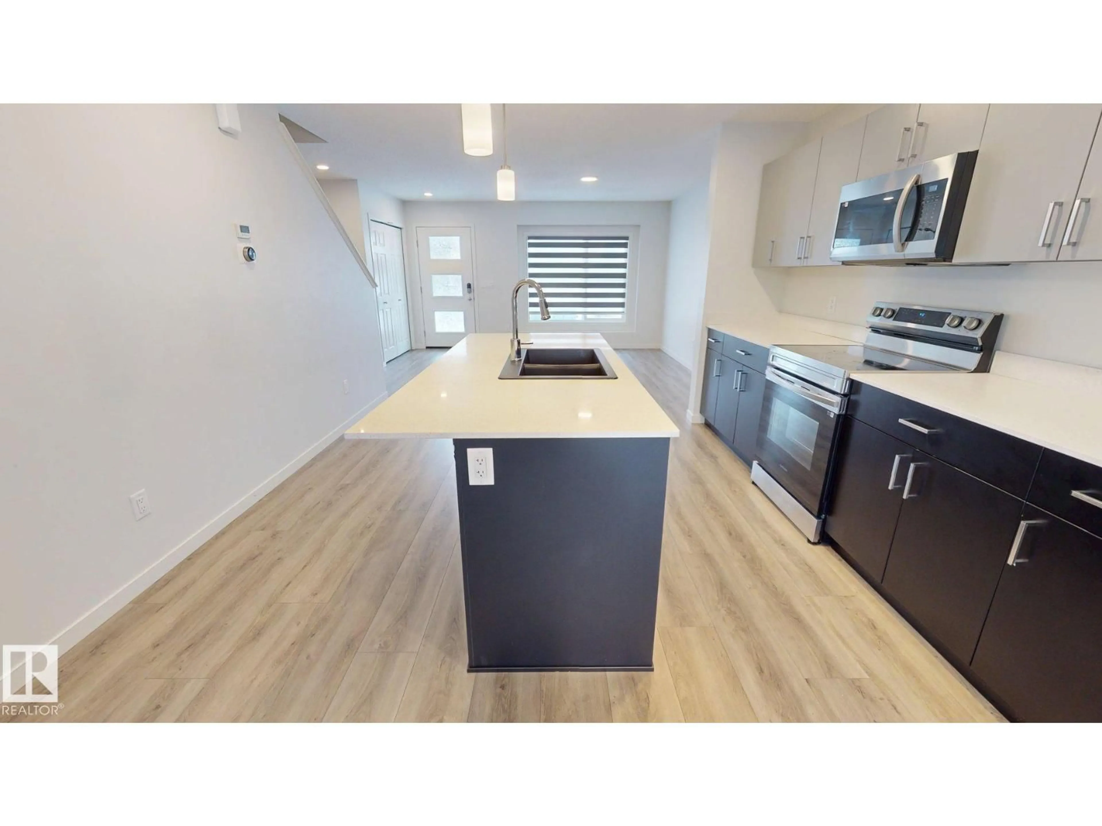 Open concept kitchen, unknown for 7104 46A ST, Beaumont Alberta T4X3B8