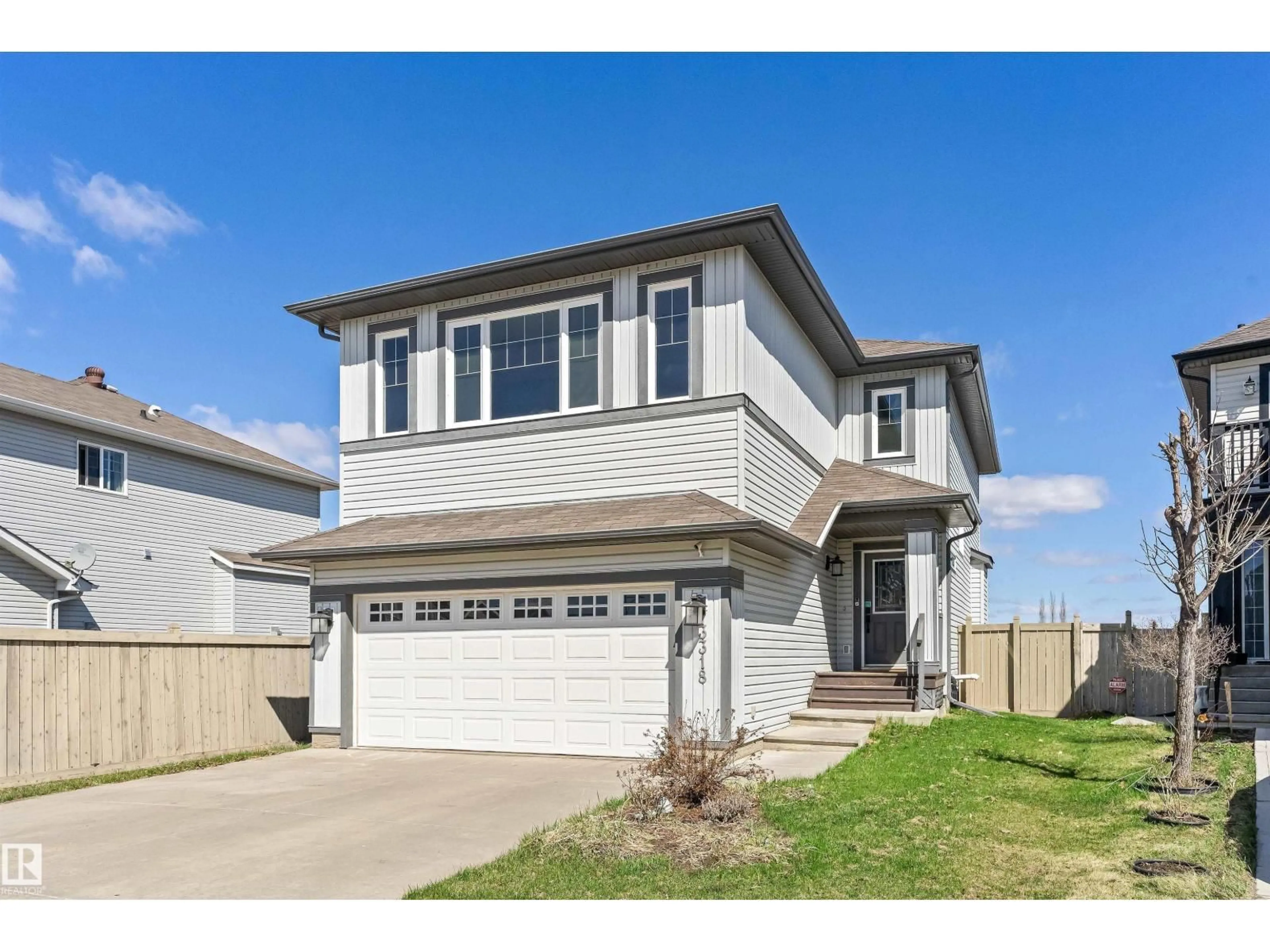 Home with vinyl exterior material, street for 3318 21A AV, Edmonton Alberta T6T0L1