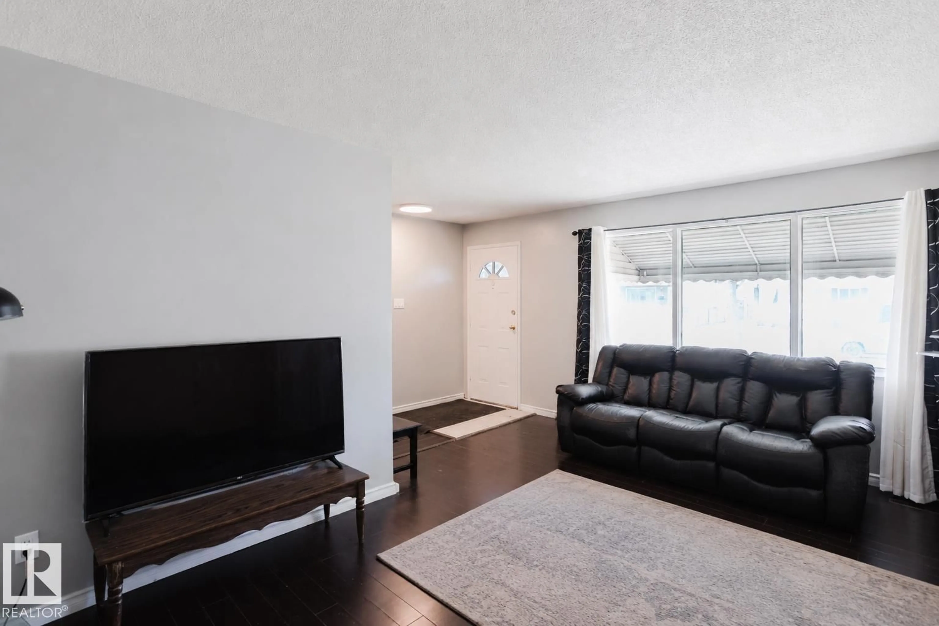 Living room with furniture, unknown for NW - 10325 152 ST, Edmonton Alberta T5P1Y4