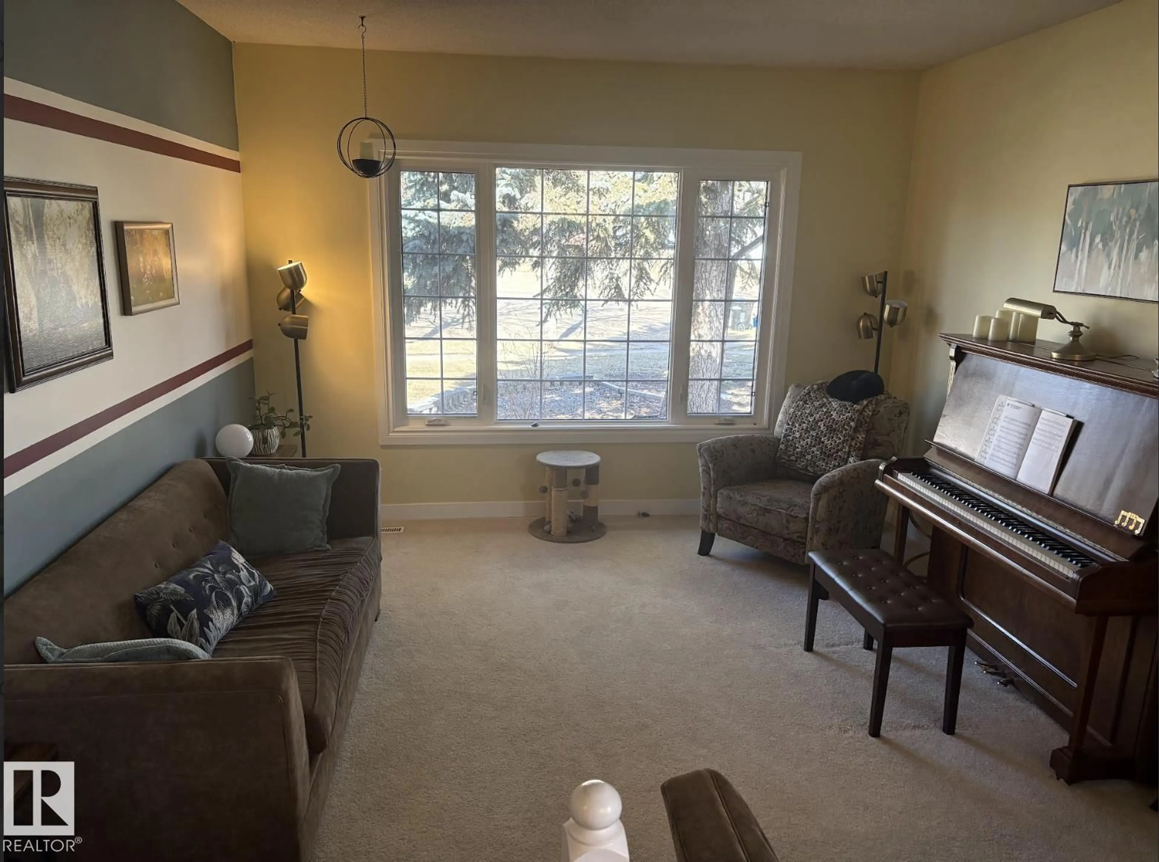 Living room with furniture, unknown for 4209 63 ST, Camrose Alberta T4V2W3