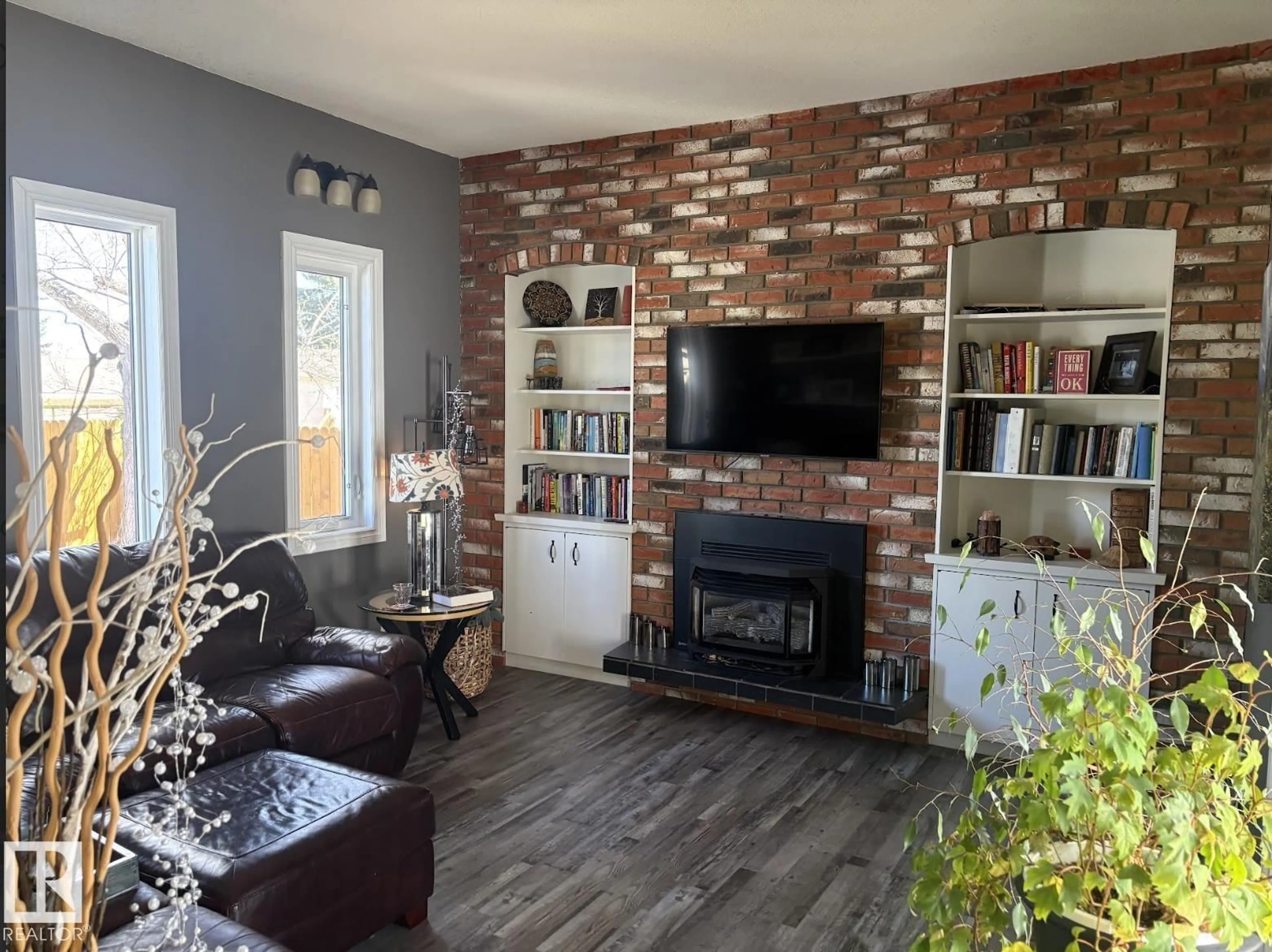 Living room with furniture, unknown for 4209 63 ST, Camrose Alberta T4V2W3