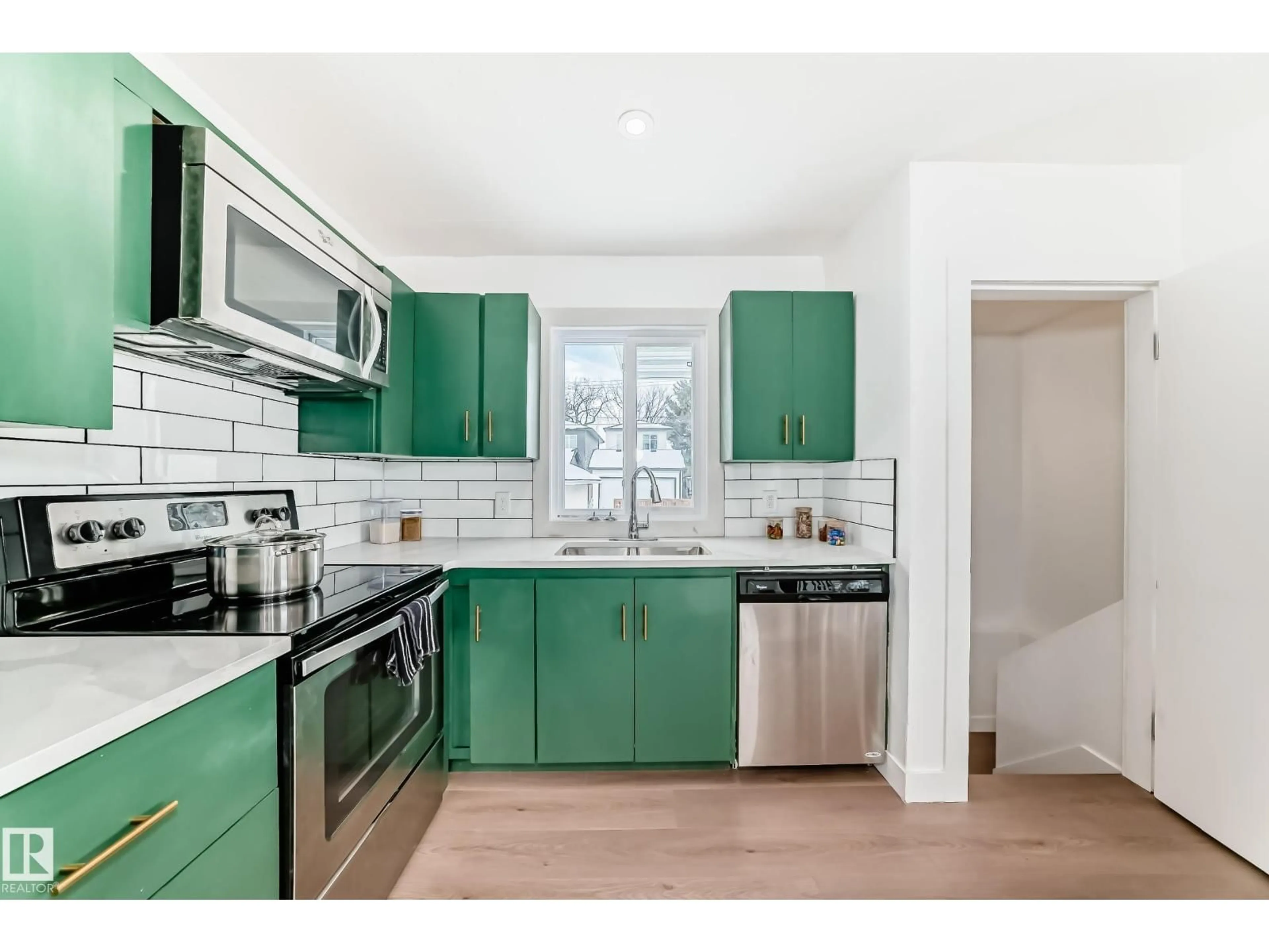 Open concept kitchen, unknown for NW - 8712 89 AV, Edmonton Alberta T6C1N7
