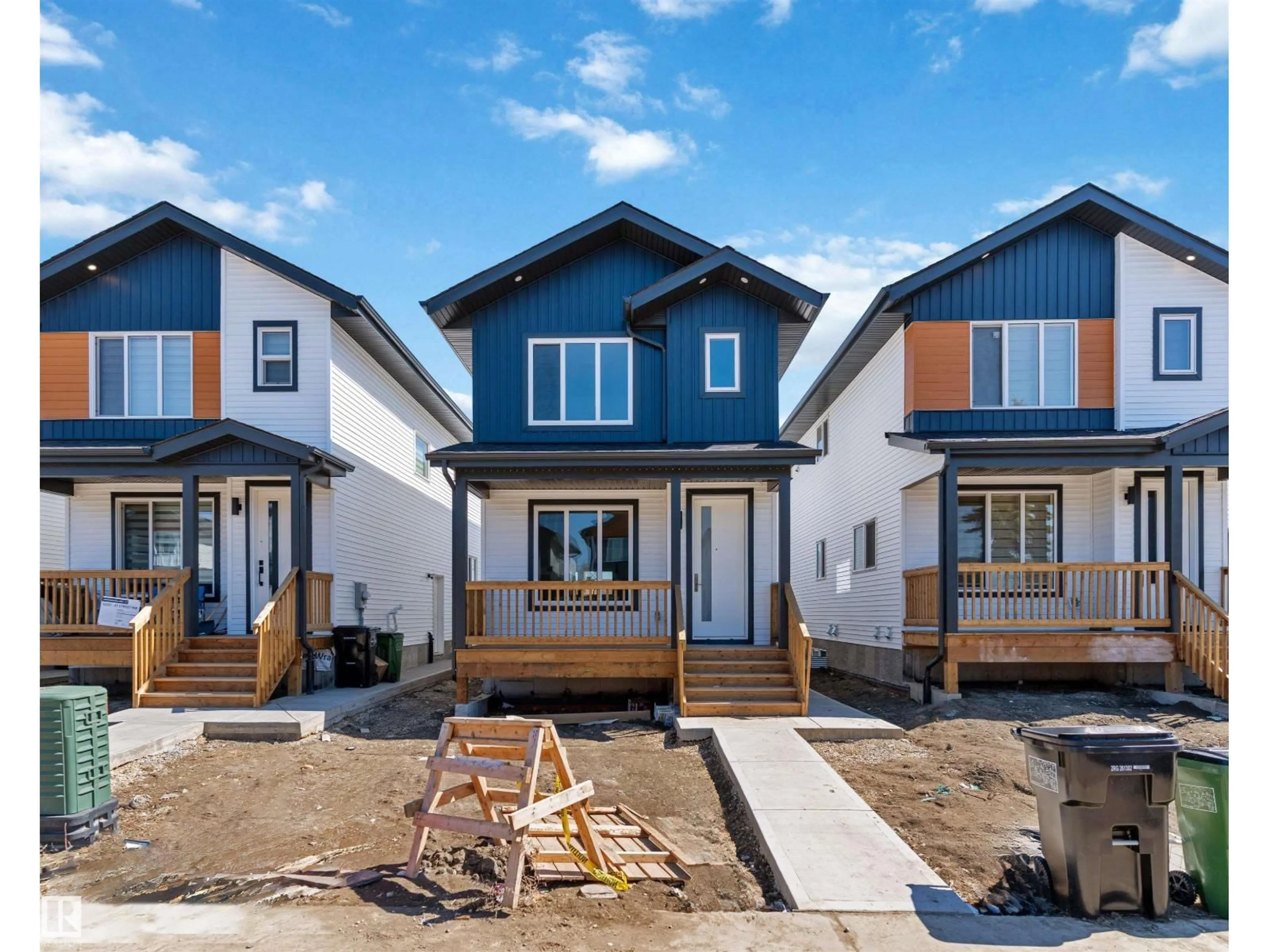 Home with vinyl exterior material, street for NW - 12427 47 ST, Edmonton Alberta T5W5E5
