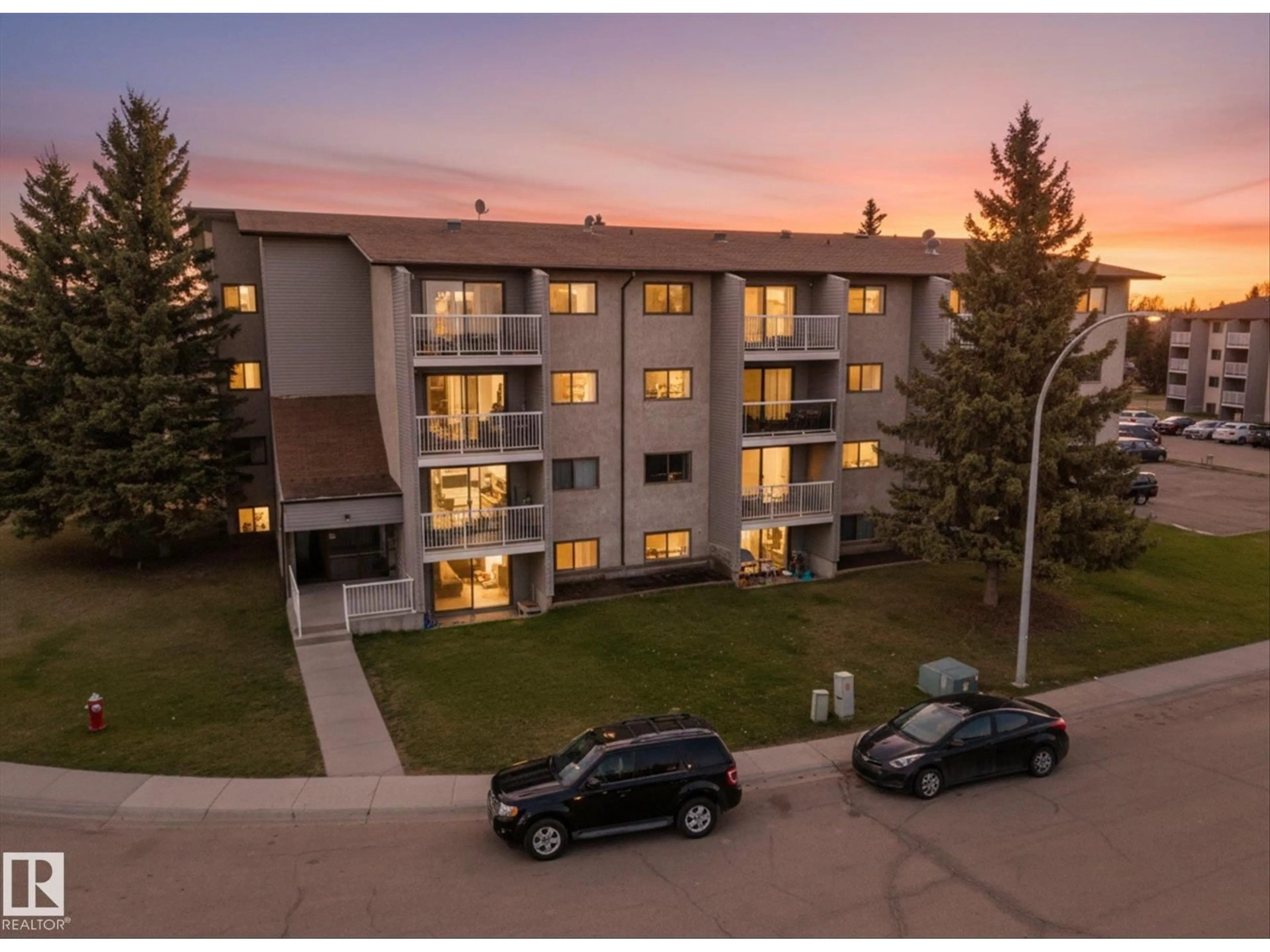 A pic from outside/outdoor area/front of a property/back of a property/a pic from drone, mountain view for 101 BROWN ST, Stony Plain Alberta T7Z1P2