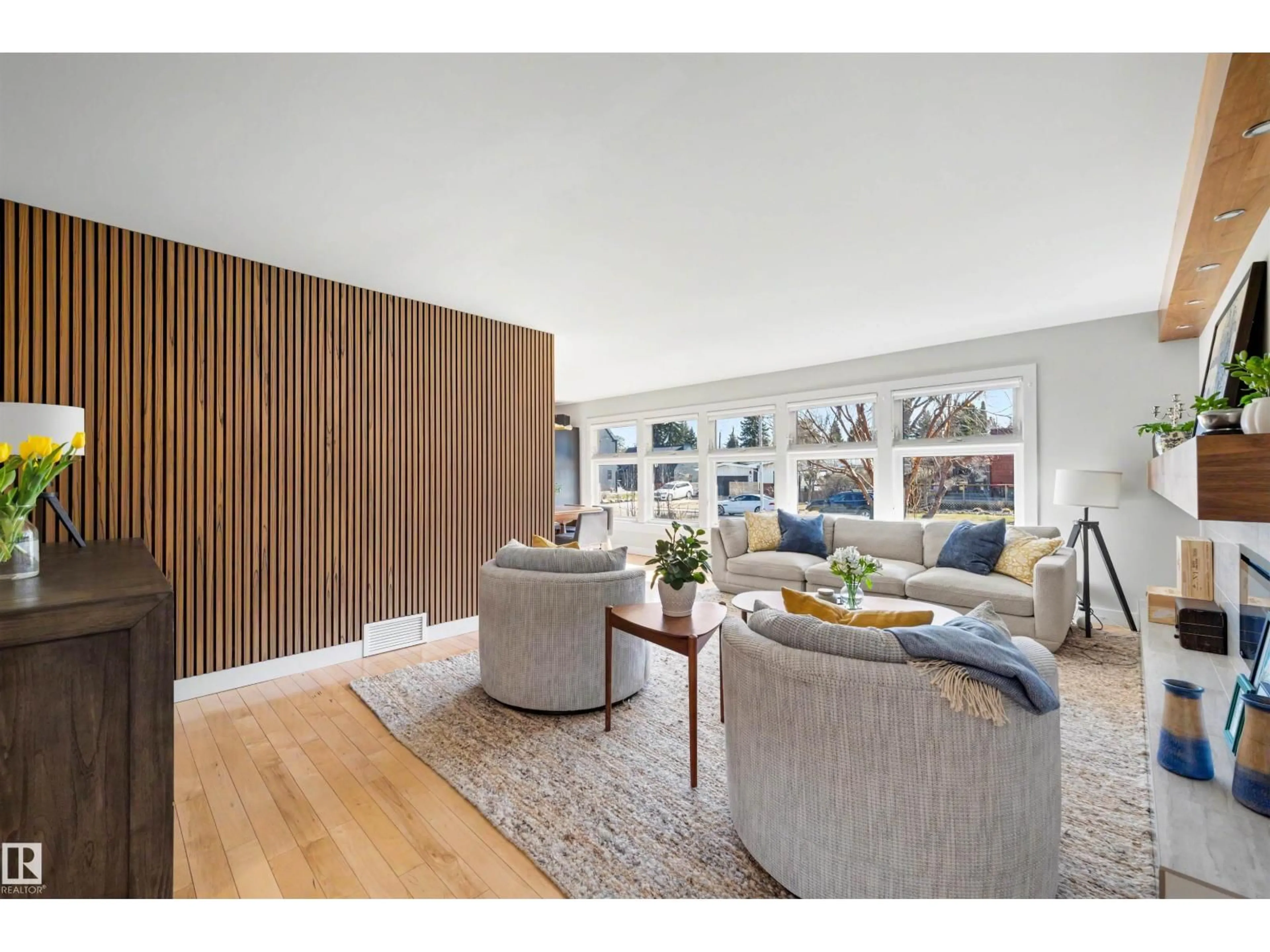 Living room with furniture, wood/laminate floor for 9124 141 ST, Edmonton Alberta T5R0L4