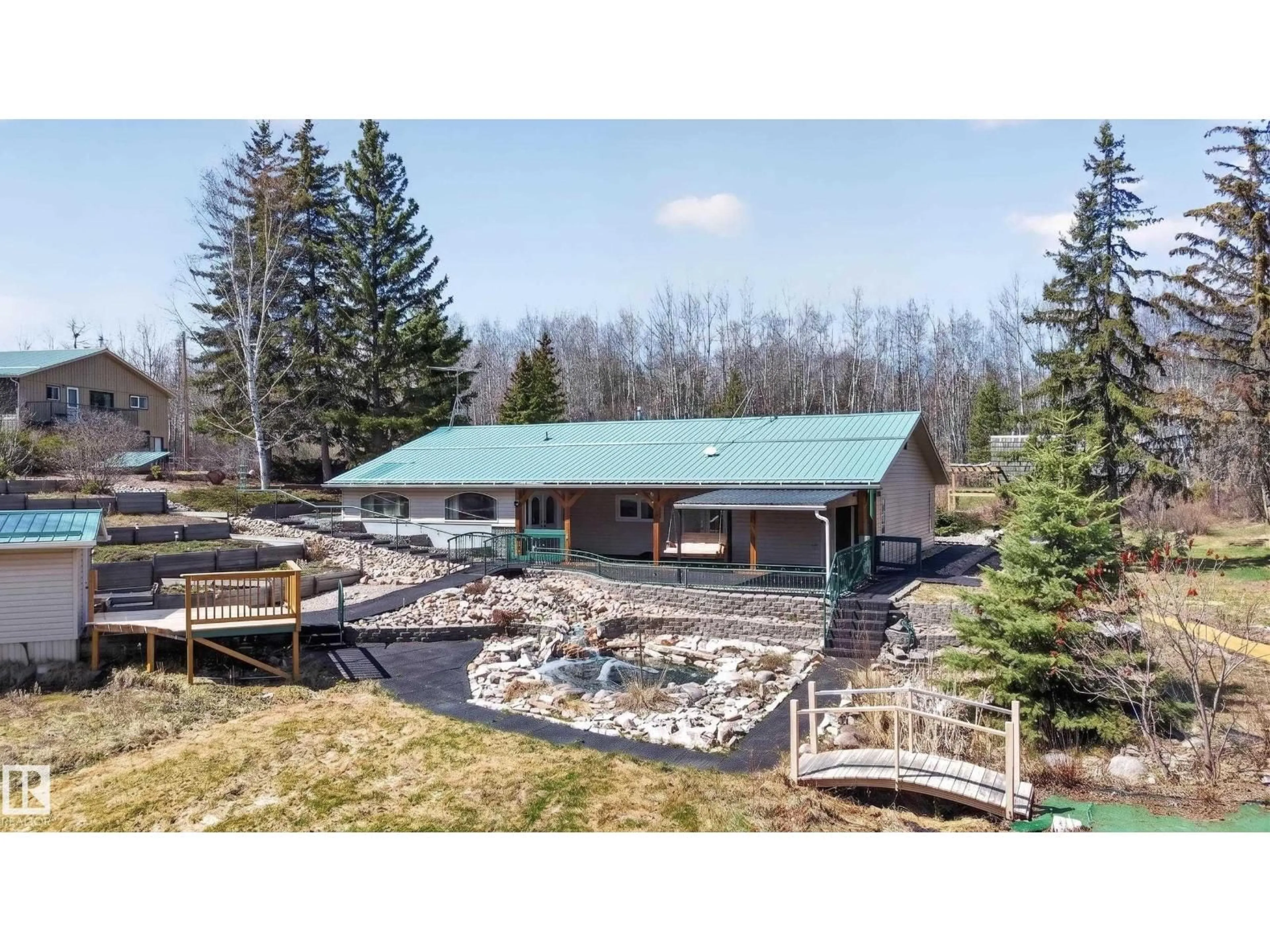 A pic from outside/outdoor area/front of a property/back of a property/a pic from drone, unknown for 121 55107 RGE RD 33, Rural Lac Ste. Anne County Alberta T0E1A0