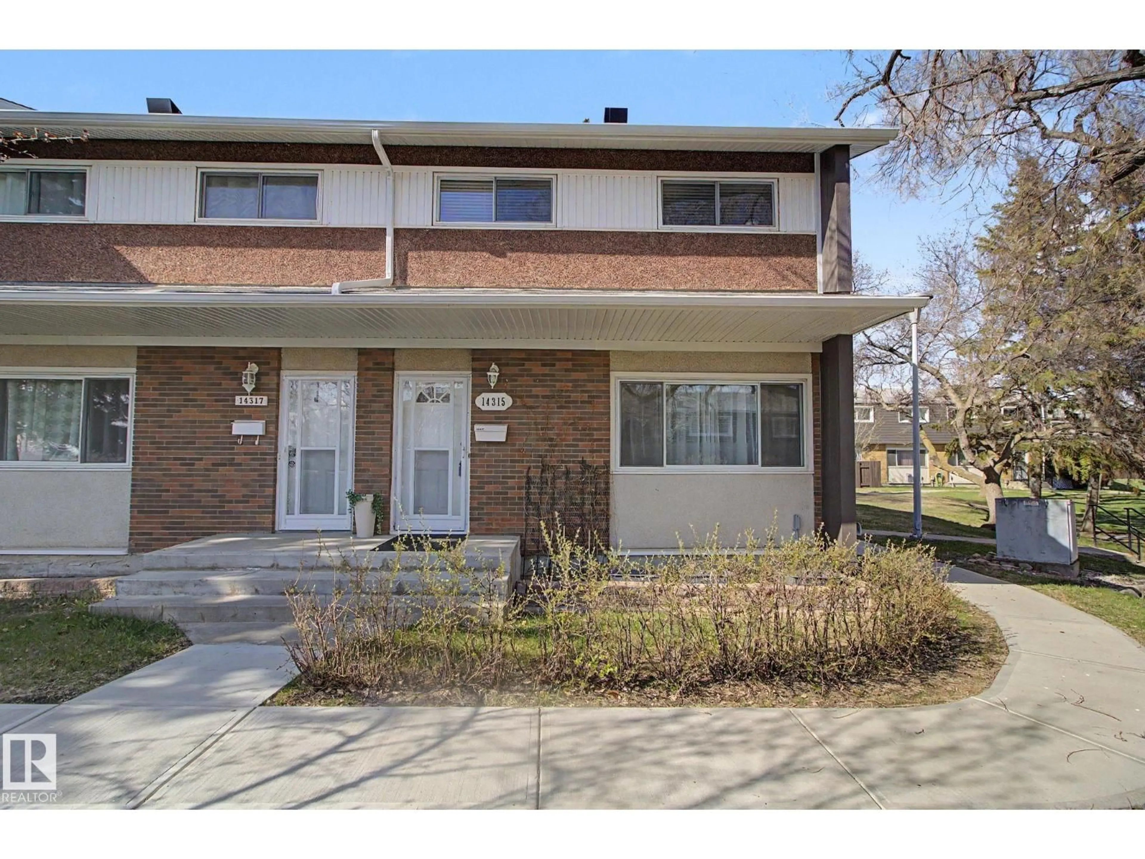 Home with brick exterior material, street for 14315 58 ST, Edmonton Alberta T5A1N6