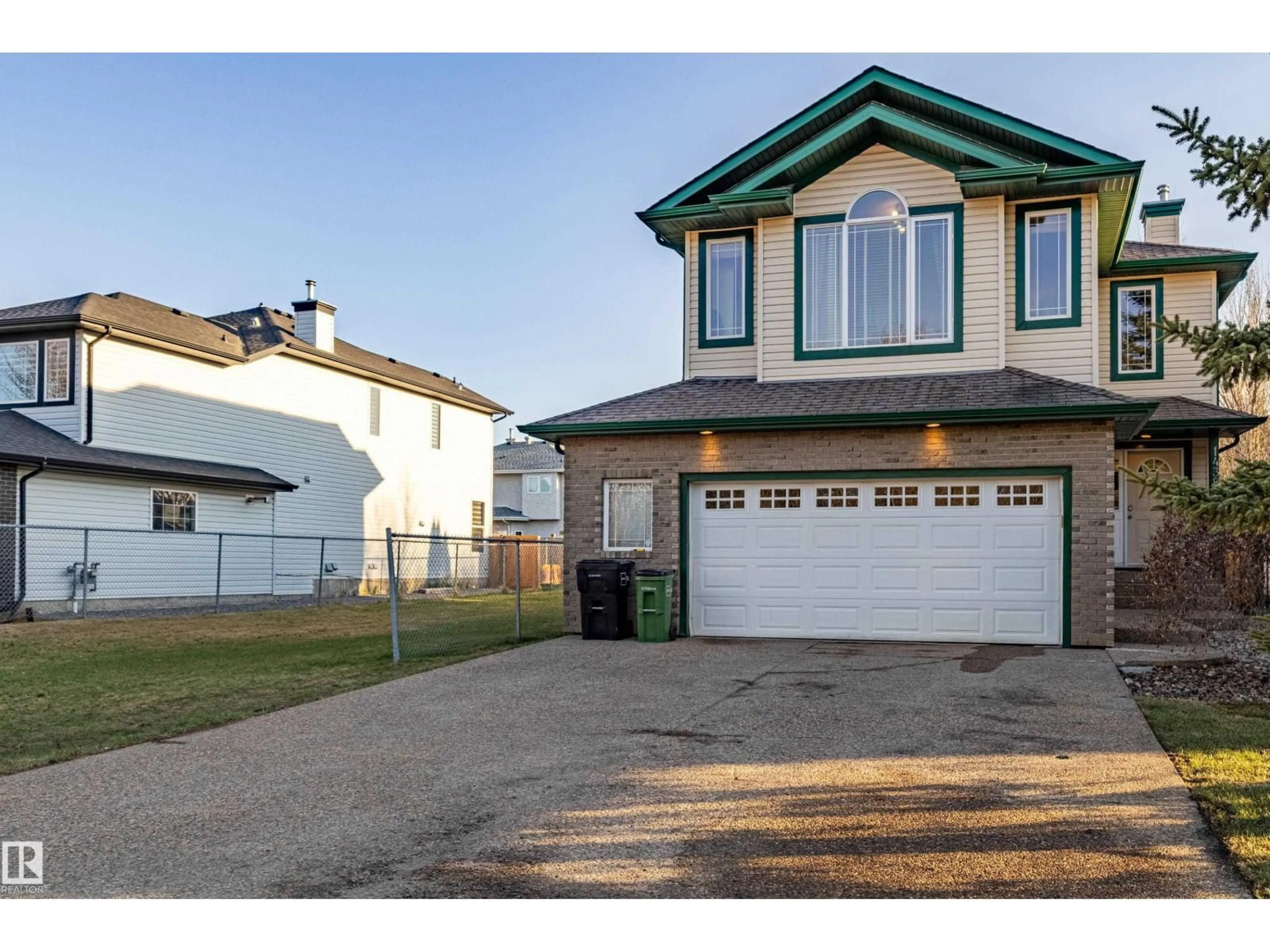 Home with vinyl exterior material, street for 1438 POTTER GREENS DR, Edmonton Alberta T5T1J8