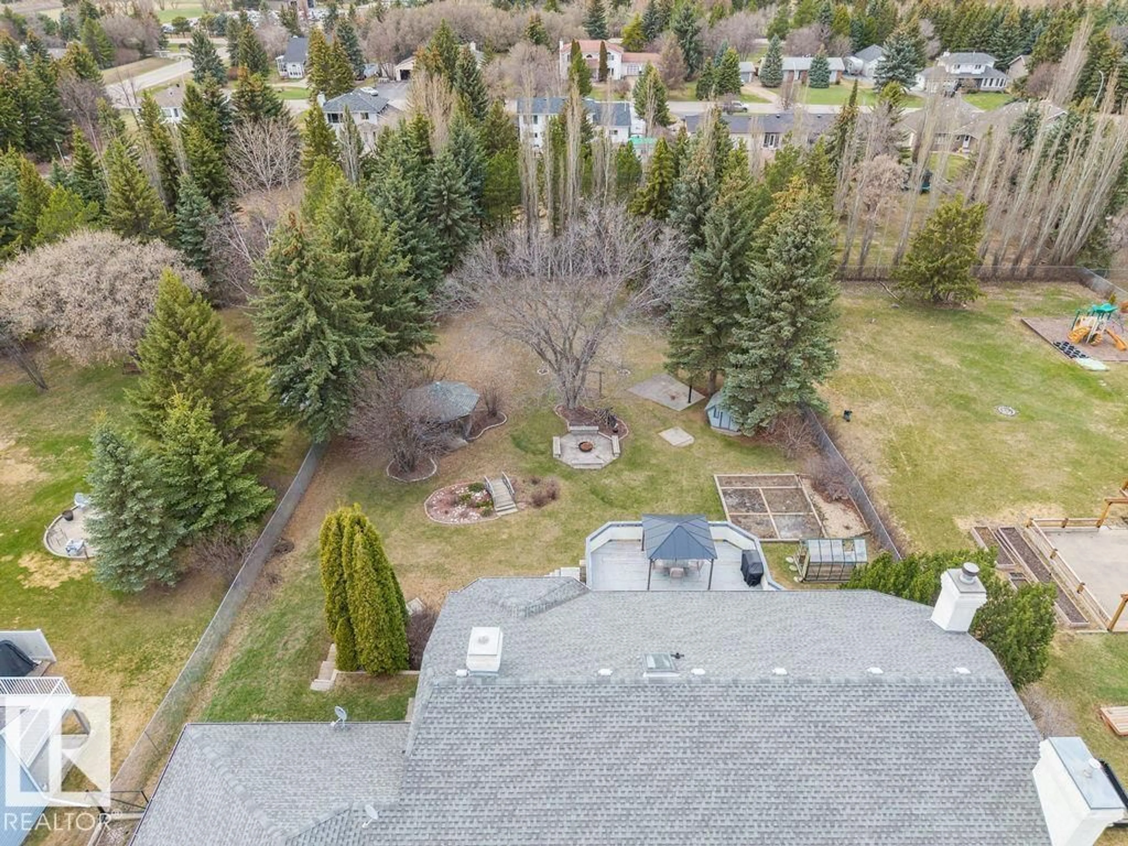 A pic from outside/outdoor area/front of a property/back of a property/a pic from drone, forest/trees view for 60 STURGEON VIEW CR, Rural Sturgeon County Alberta T8N1M9