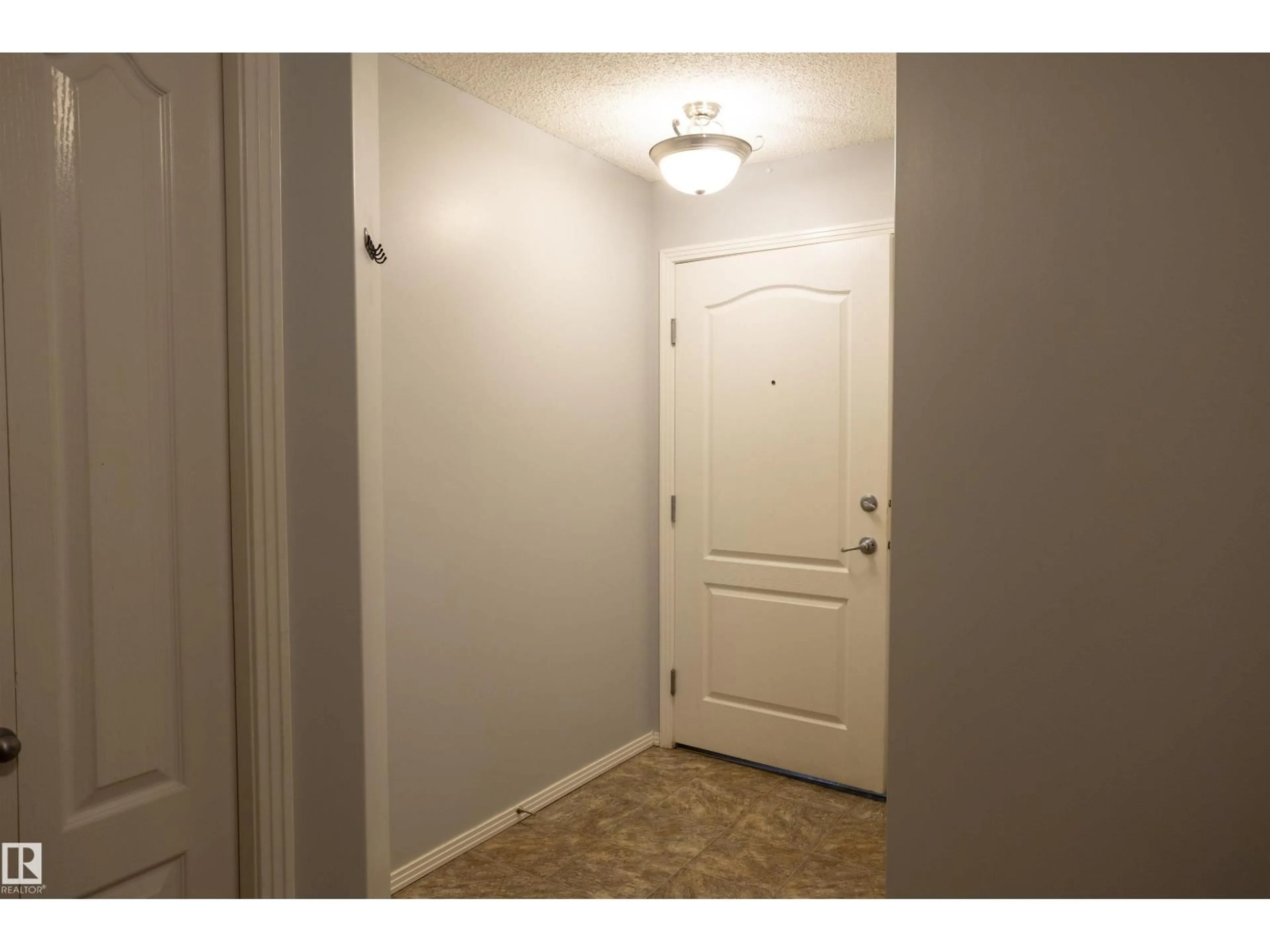 Indoor entryway for #101 - 2420 108 ST, Edmonton Alberta T6J7J3