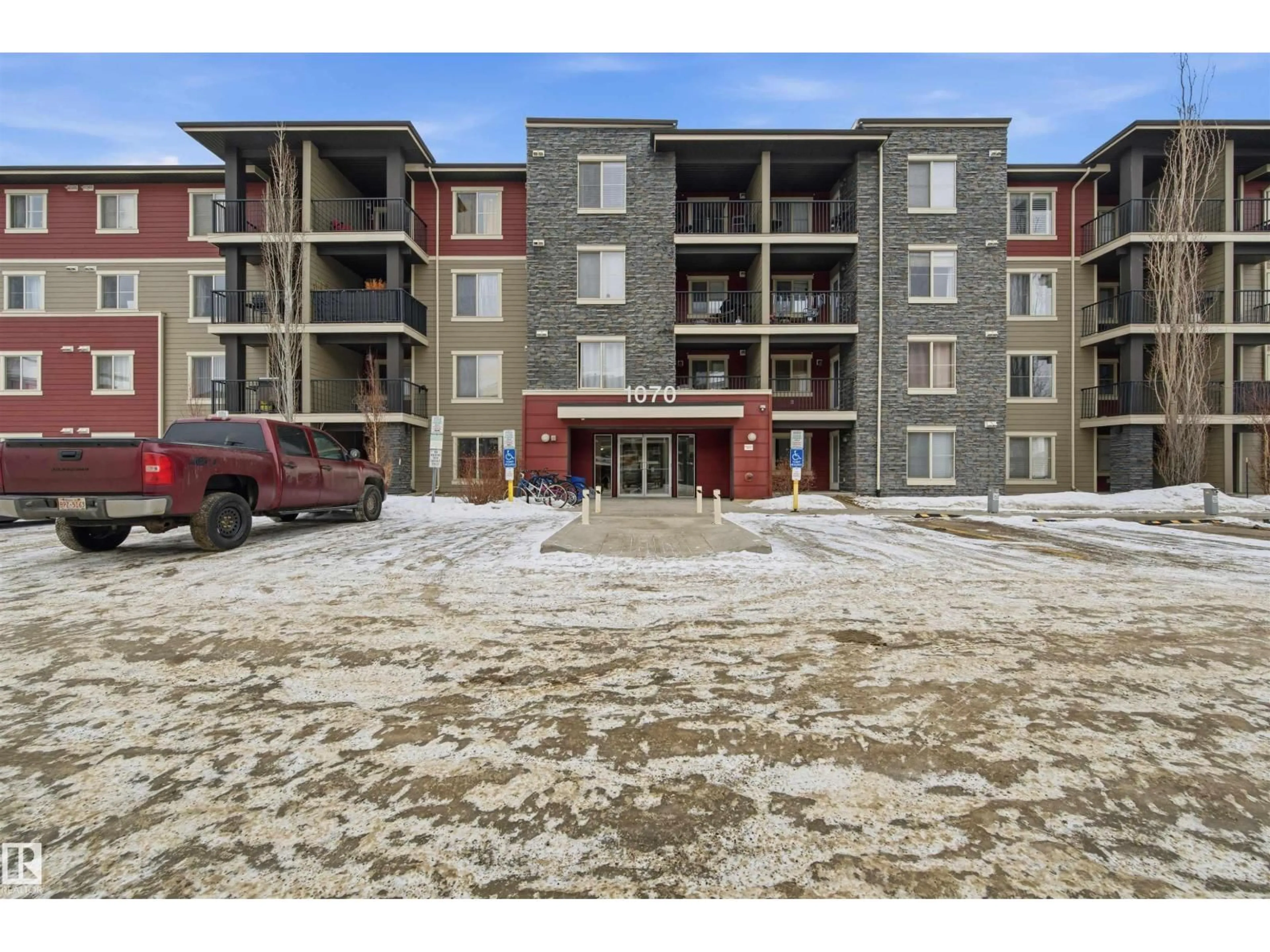 A pic from outside/outdoor area/front of a property/back of a property/a pic from drone, building for #221 - 1070 MCCONACHIE BV, Edmonton Alberta T5Y0X1