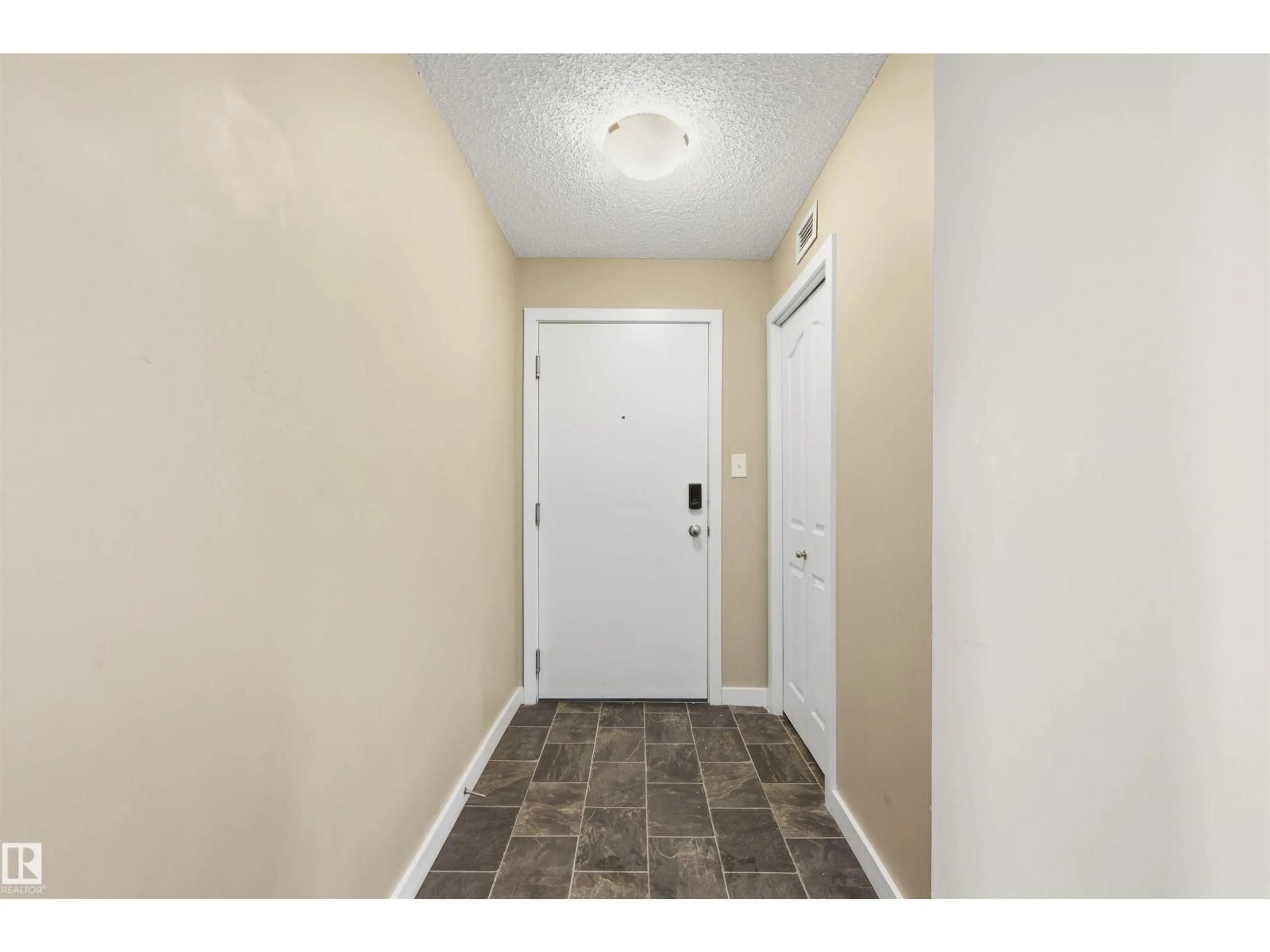 Indoor entryway for #221 - 1070 MCCONACHIE BV, Edmonton Alberta T5Y0X1