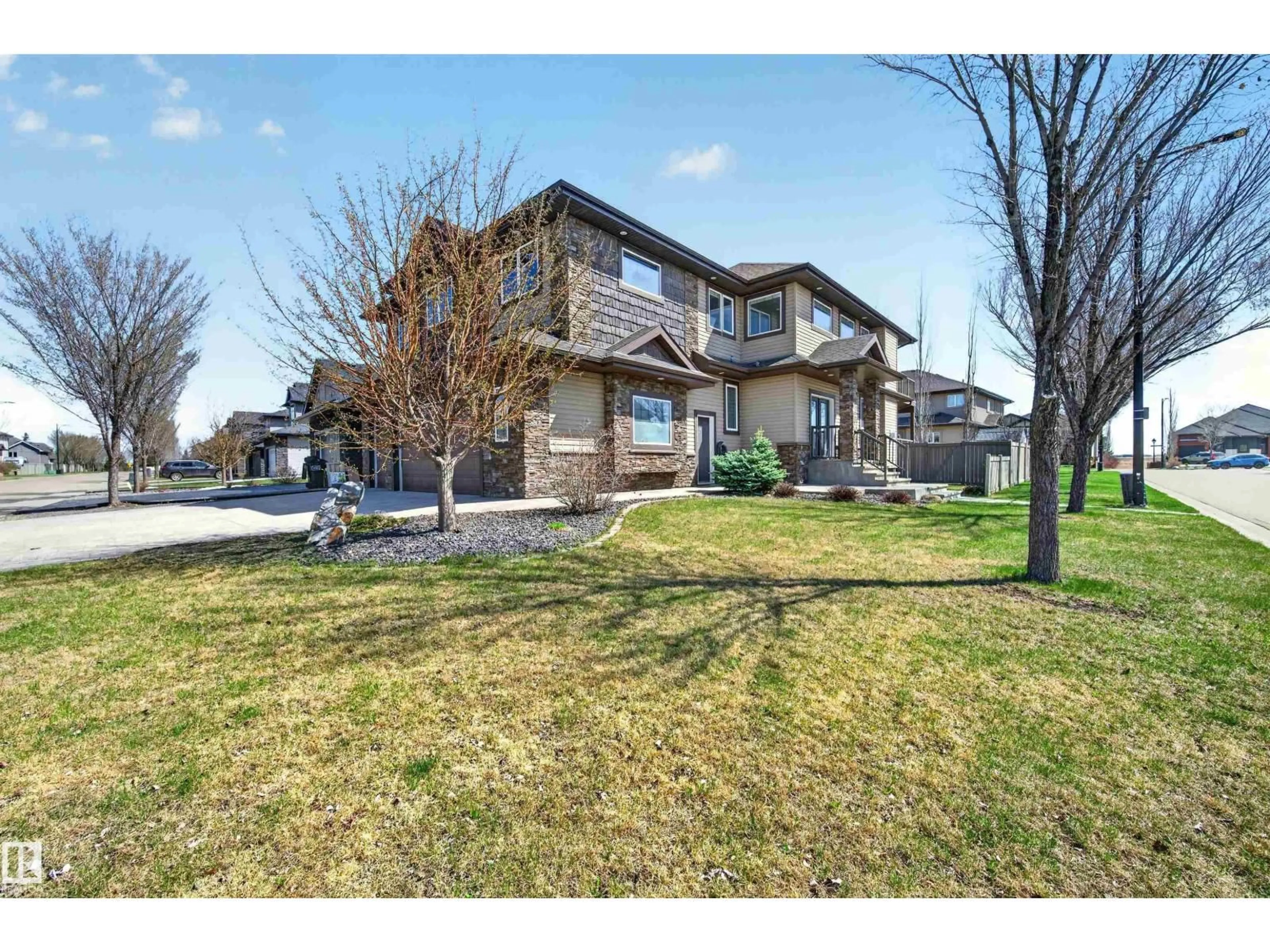 A pic from outside/outdoor area/front of a property/back of a property/a pic from drone, street for 1254 ADAMSON DR, Edmonton Alberta T6W1Z4