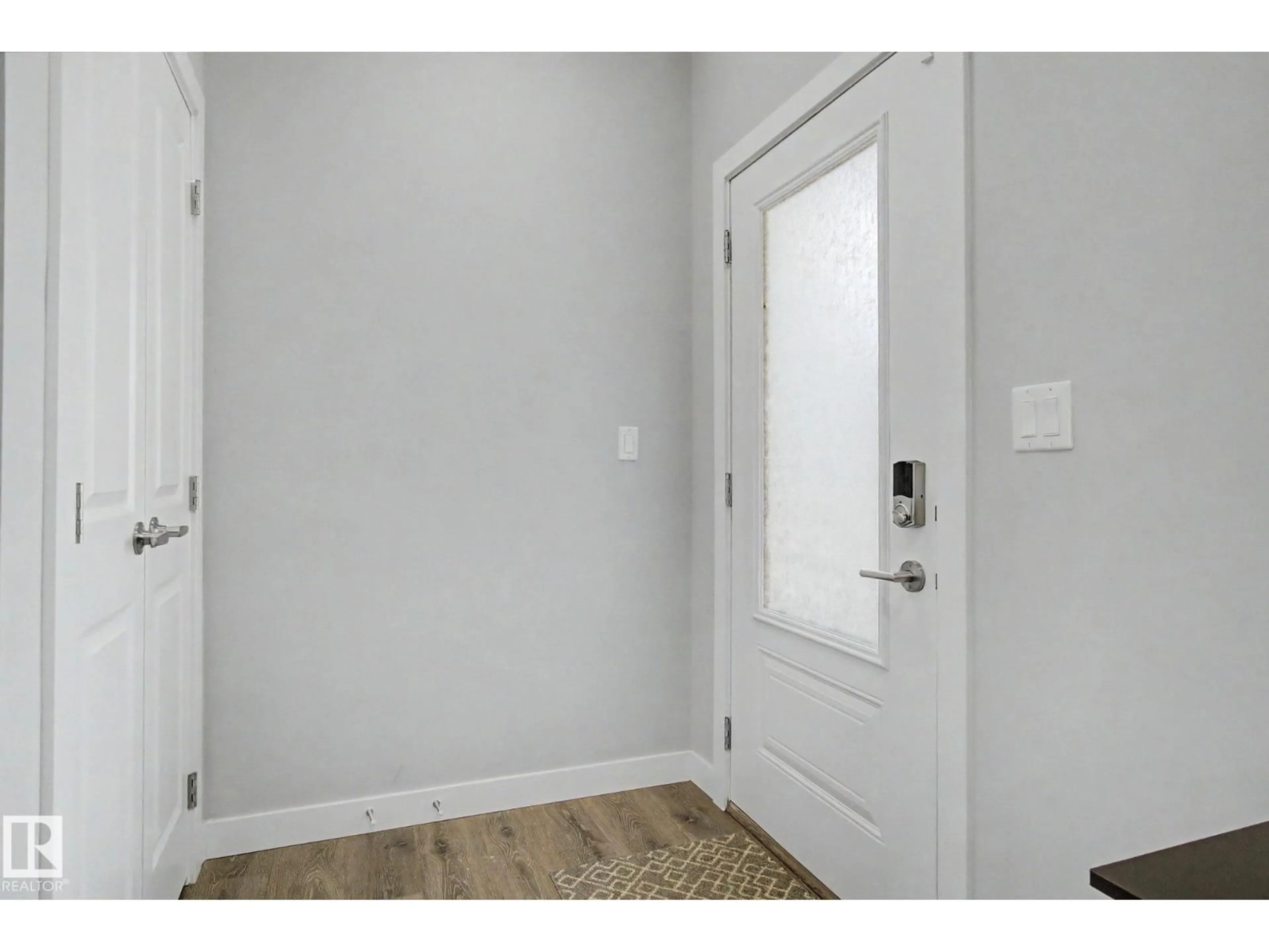 Indoor entryway for 4018 KINSELLA WY, Edmonton Alberta T6W4J5