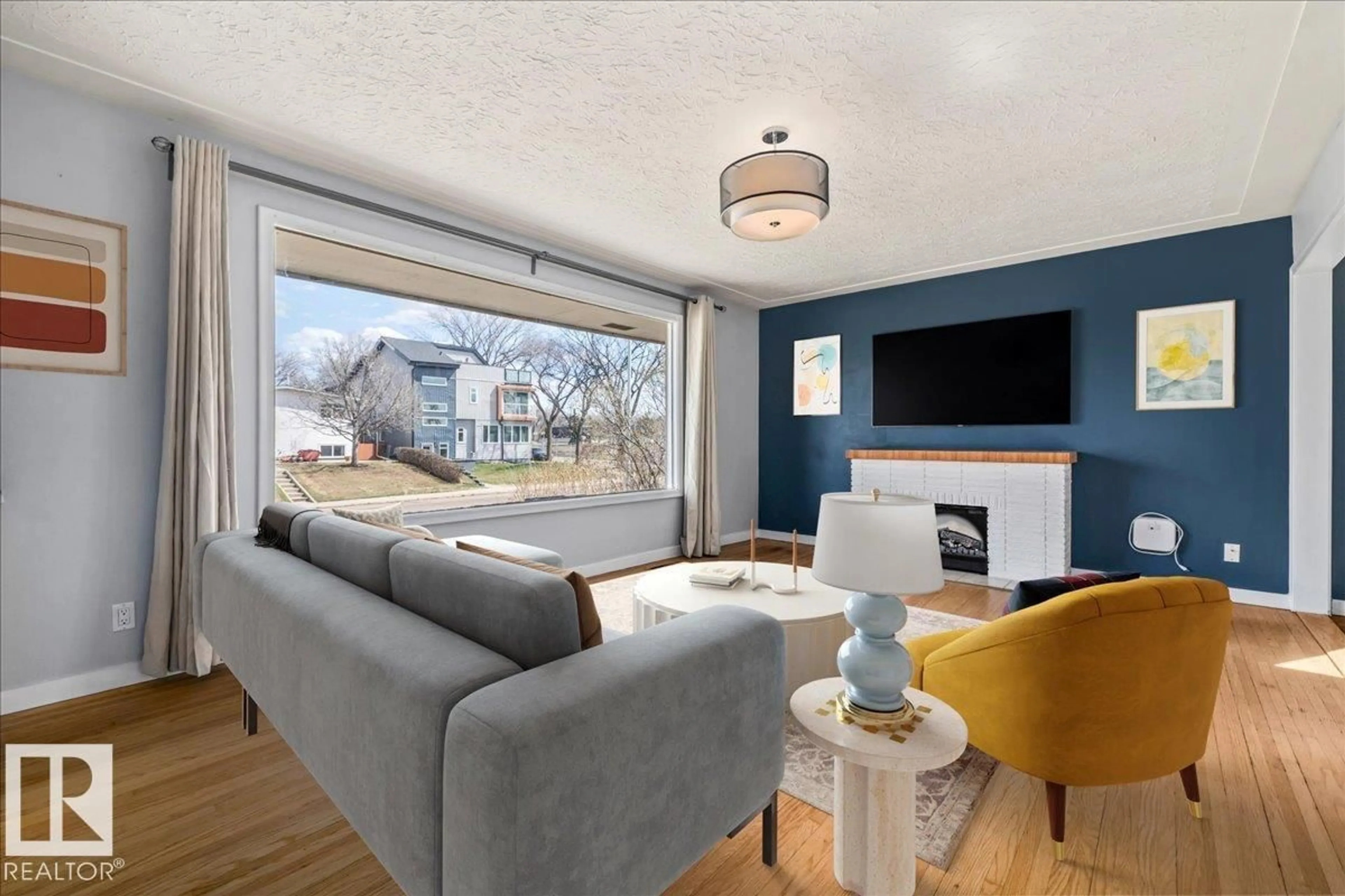 Living room with furniture, wood/laminate floor for NW - 9828 79 ST, Edmonton Alberta T6A3G1