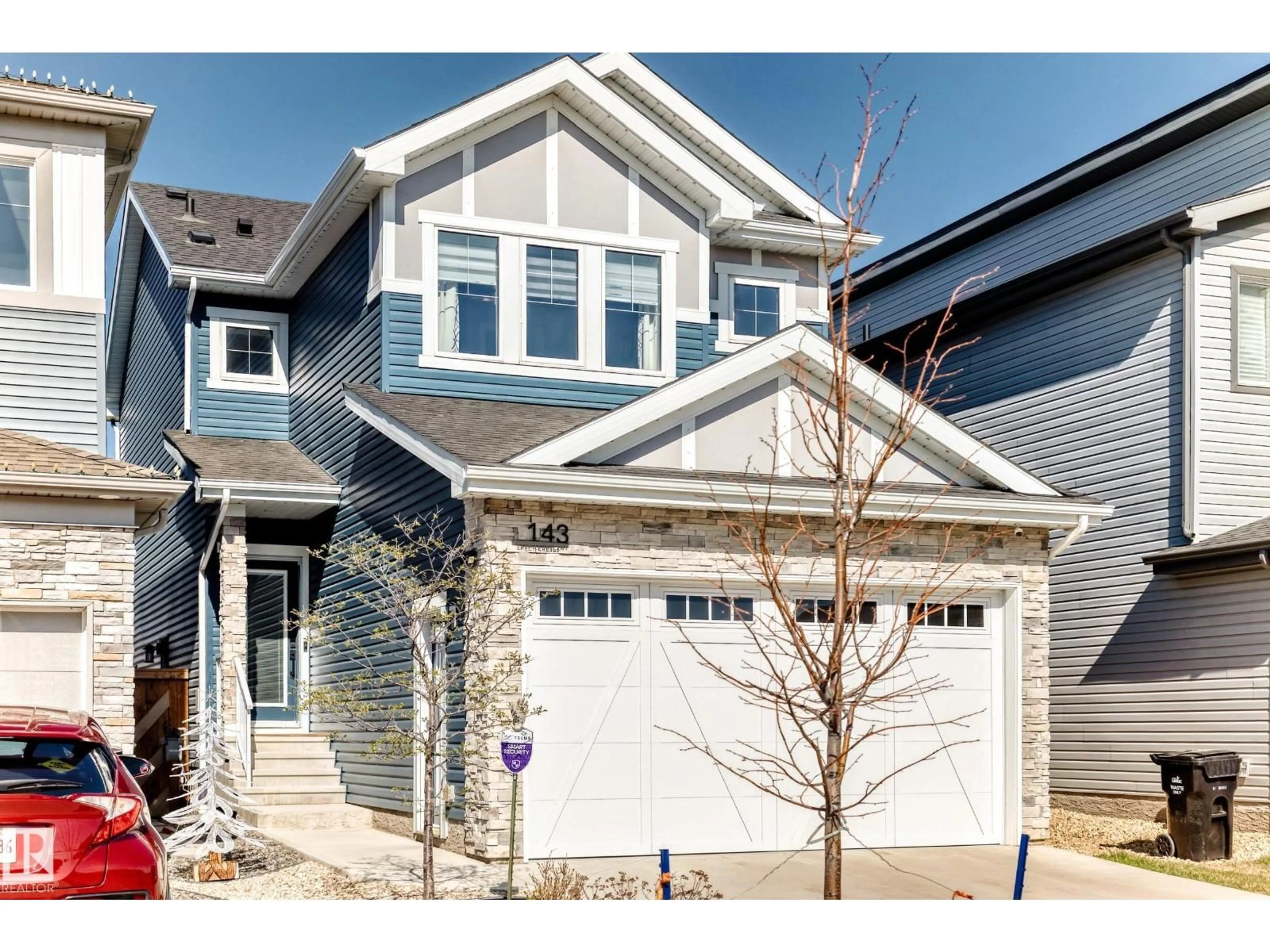Home with vinyl exterior material, street for 143 LARCH CR, Leduc Alberta T9E1N3