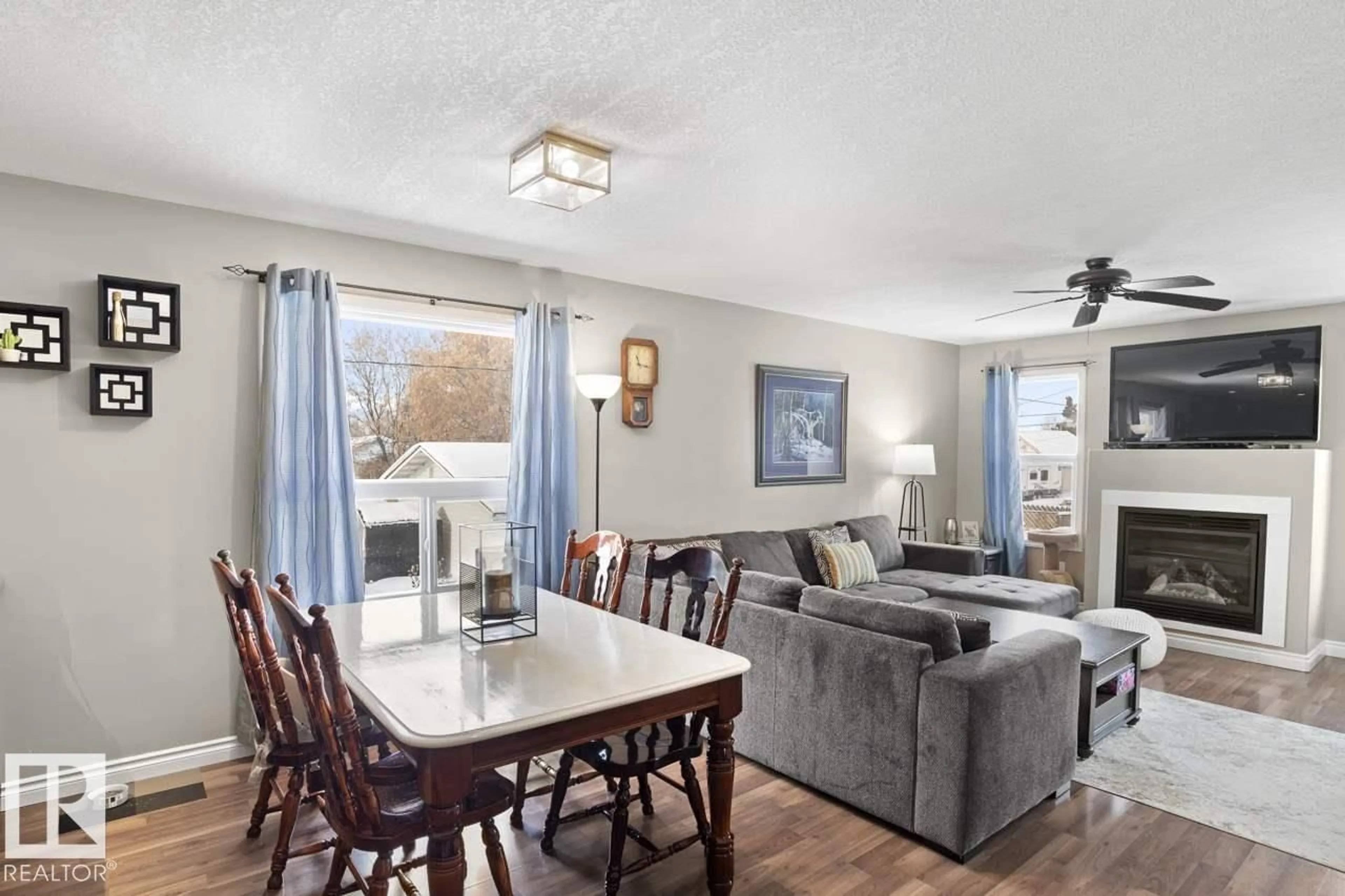 Living room with furniture, wood/laminate floor for B - 5708 51 AV, Cold Lake Alberta T9M1S4