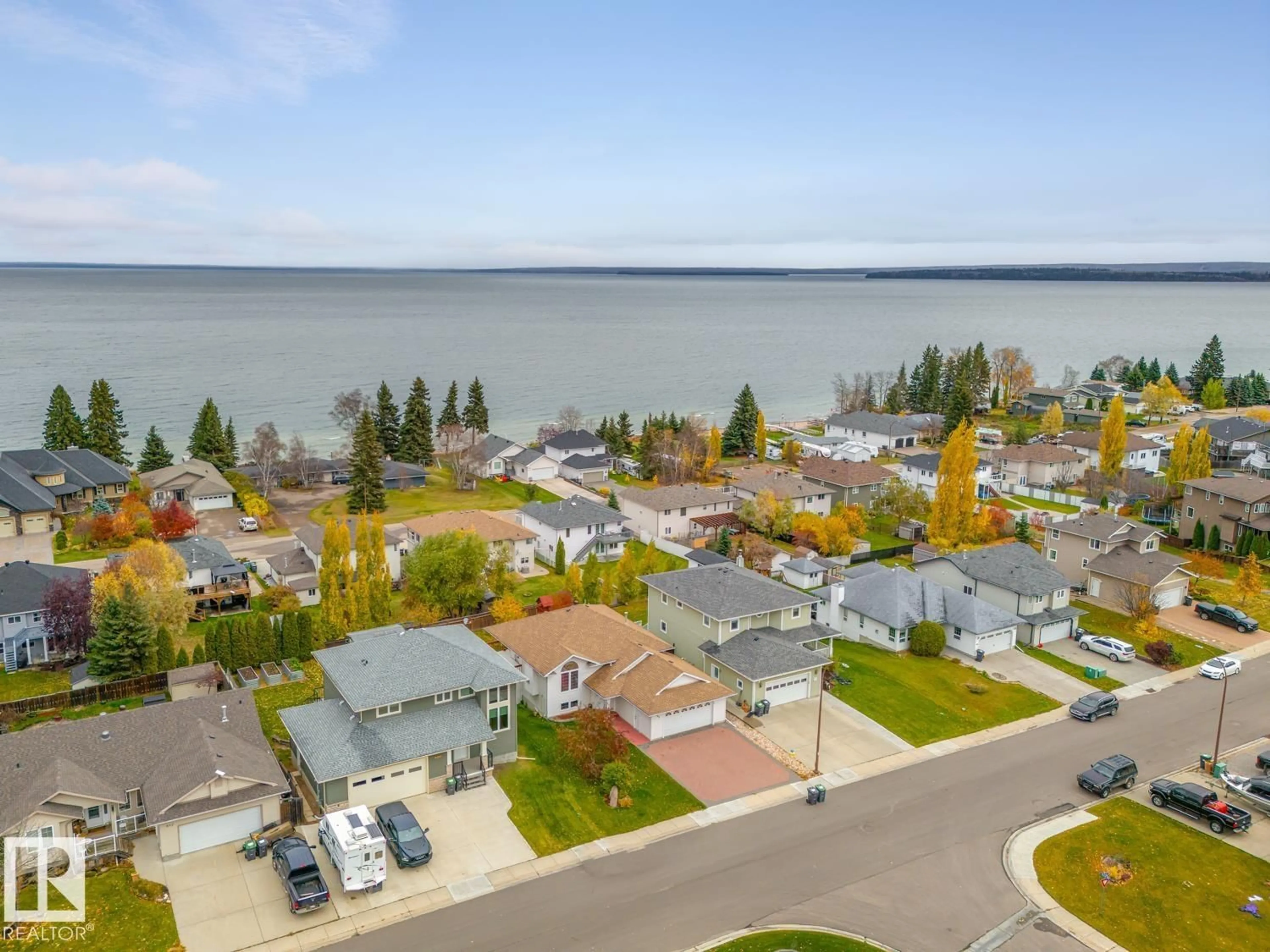 A pic from outside/outdoor area/front of a property/back of a property/a pic from drone, water/lake/river/ocean view for 808 26 ST, Cold Lake Alberta T9M1X8