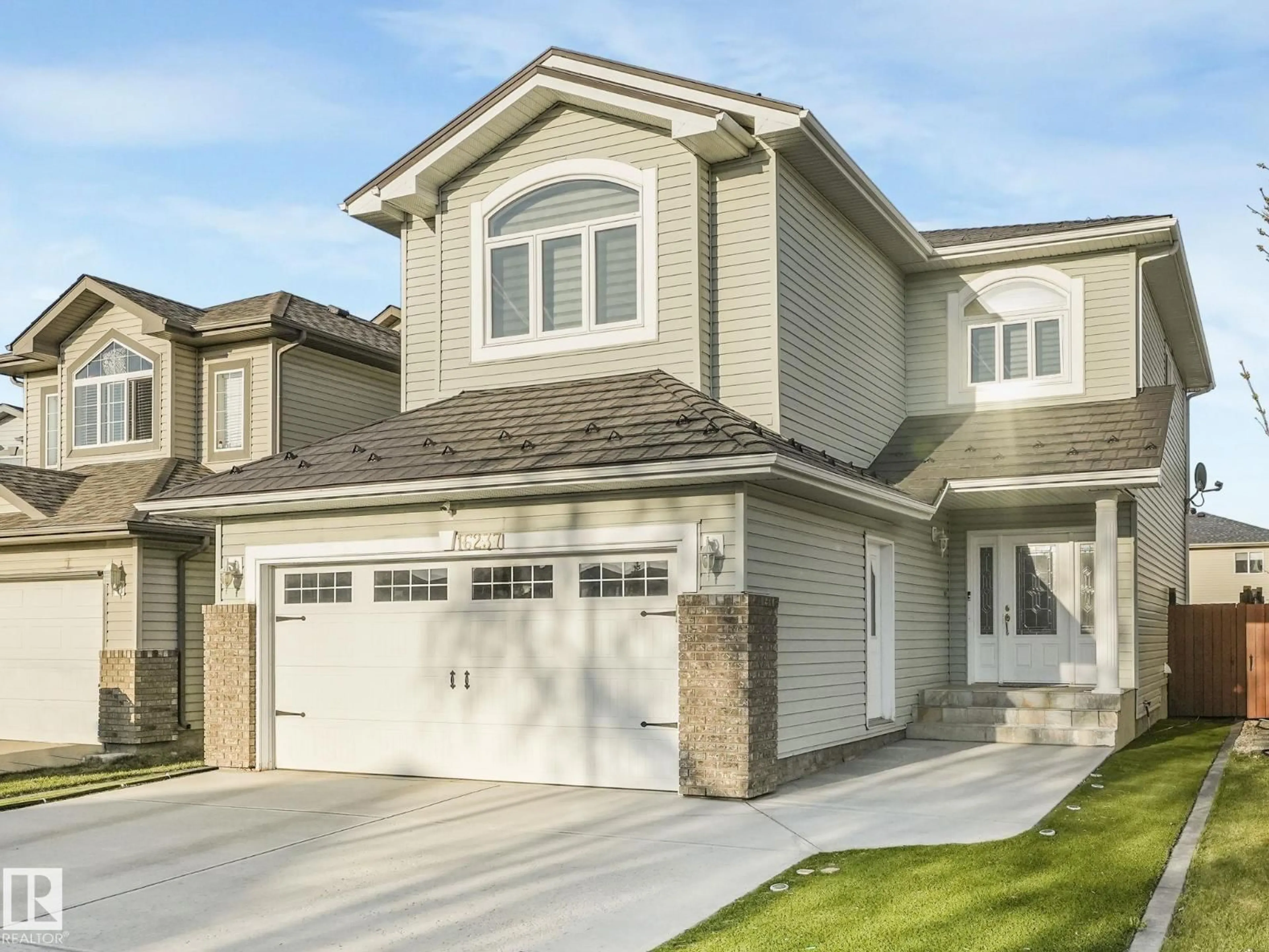 Home with vinyl exterior material, street for NW - 16237 129A ST, Edmonton Alberta T6V1T1