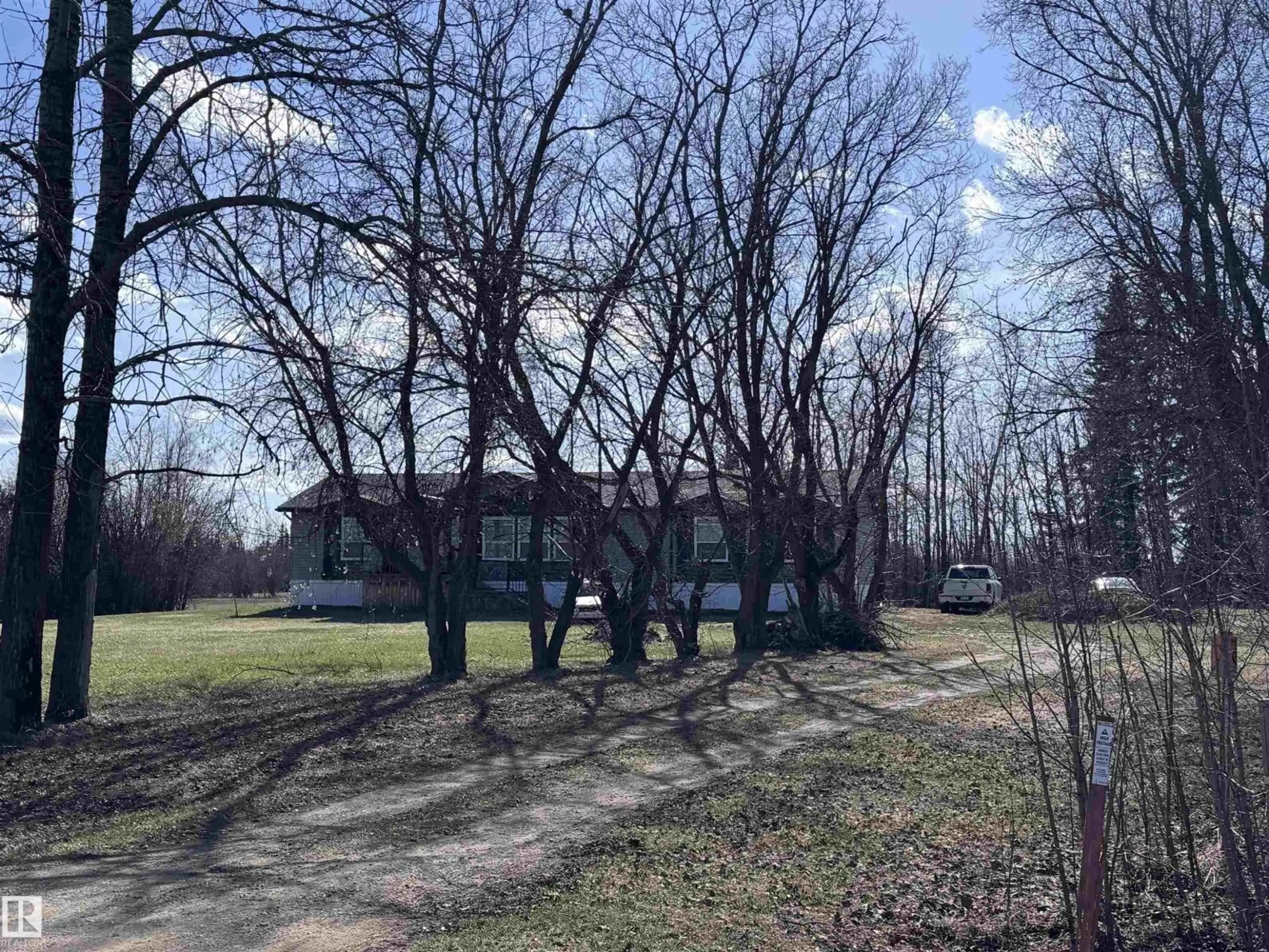 A pic from outside/outdoor area/front of a property/back of a property/a pic from drone, forest/trees view for 61516 RG RD 204, Rural Thorhild County Alberta T0A2P0
