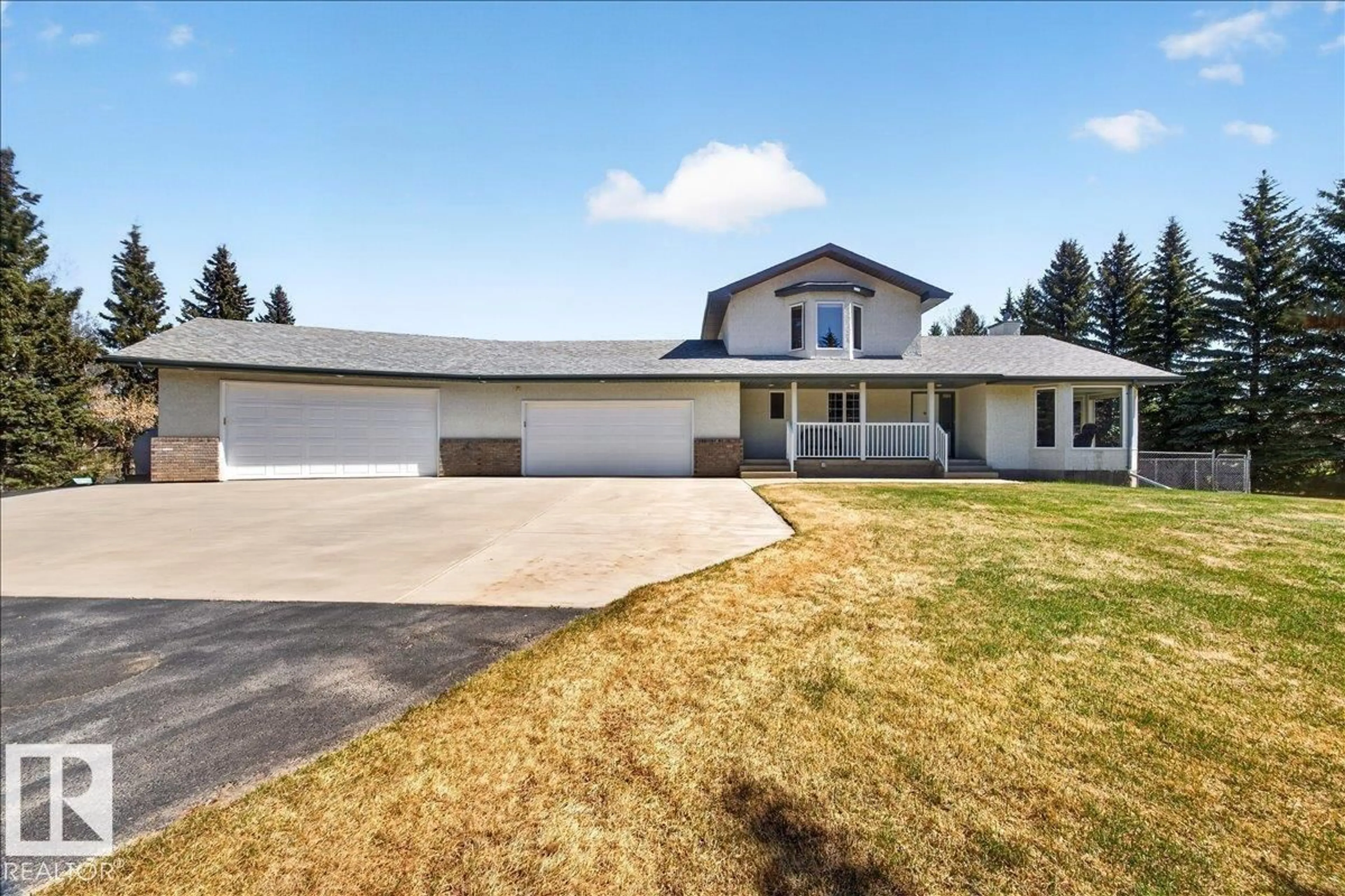 A pic from outside/outdoor area/front of a property/back of a property/a pic from drone, street for 19A RR 15 NW, Rural Parkland County Alberta T7Y0C3
