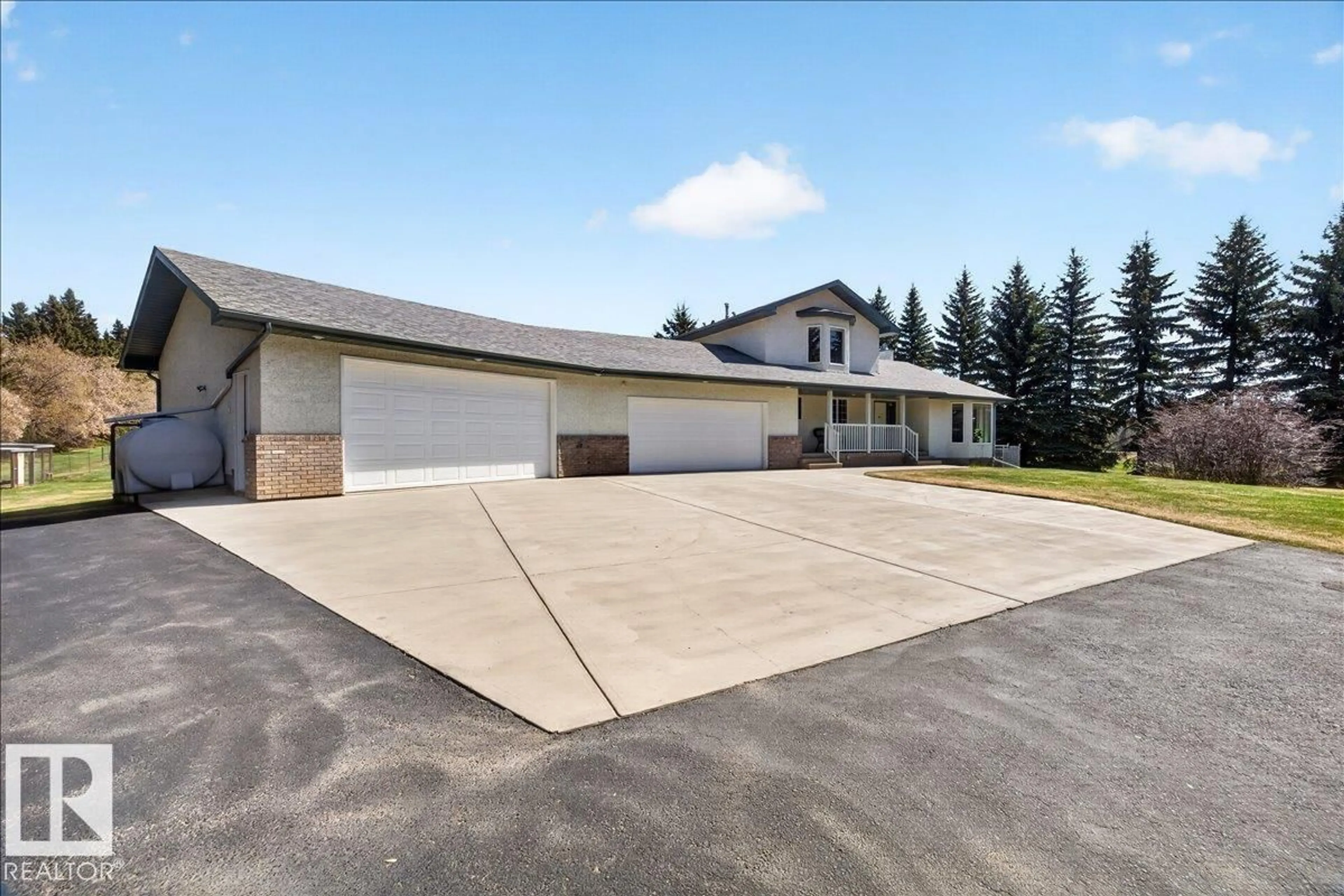 A pic from outside/outdoor area/front of a property/back of a property/a pic from drone, street for 19A RR 15 NW, Rural Parkland County Alberta T7Y0C3