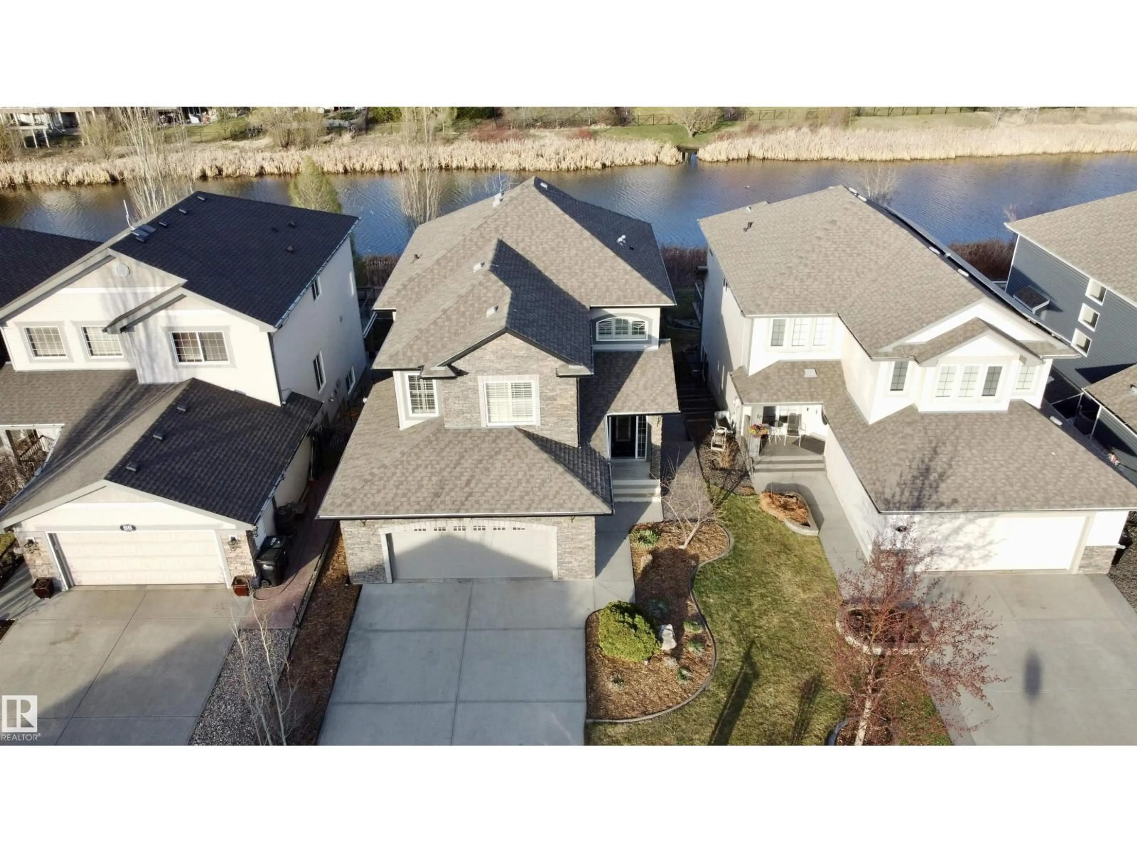 A pic from outside/outdoor area/front of a property/back of a property/a pic from drone, water/lake/river/ocean view for 70 SUMMERCOURT RD, Sherwood Park Alberta T8H2V9