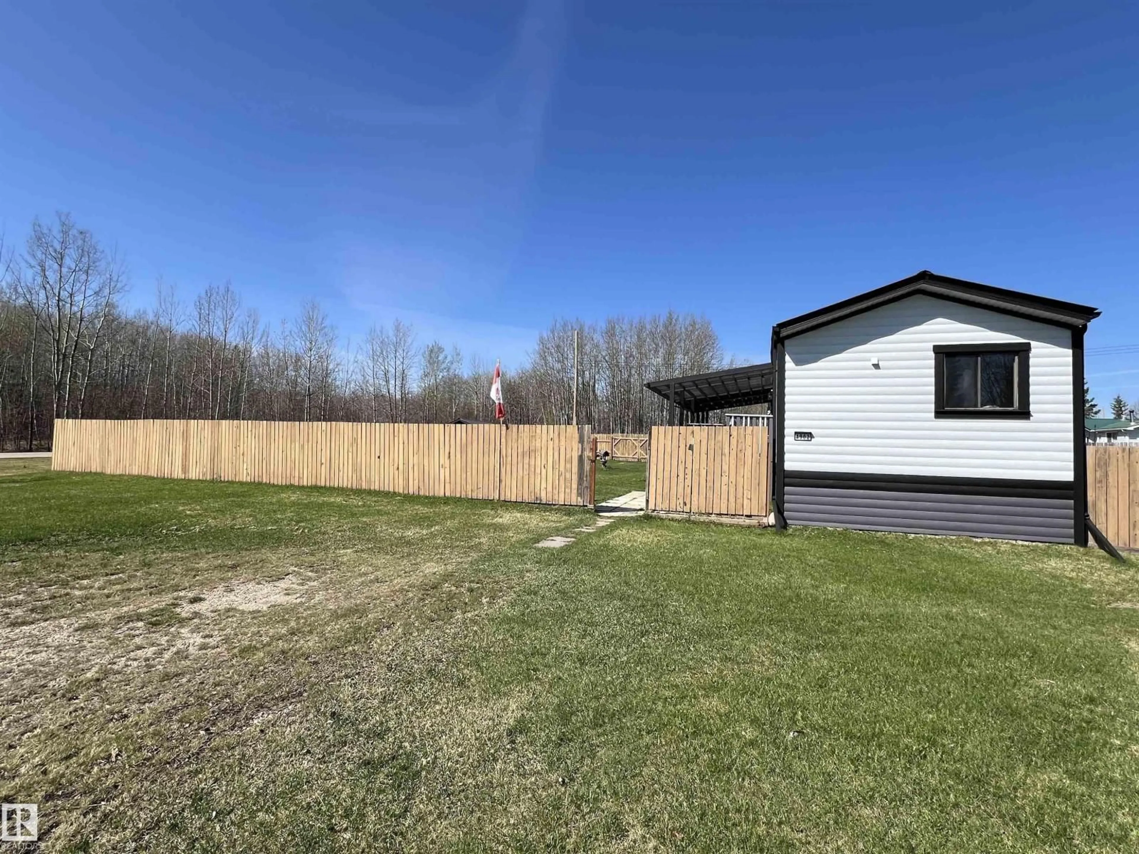A pic from outside/outdoor area/front of a property/back of a property/a pic from drone, unknown for 4902 50 ST, Buck Creek Alberta T0C0S0