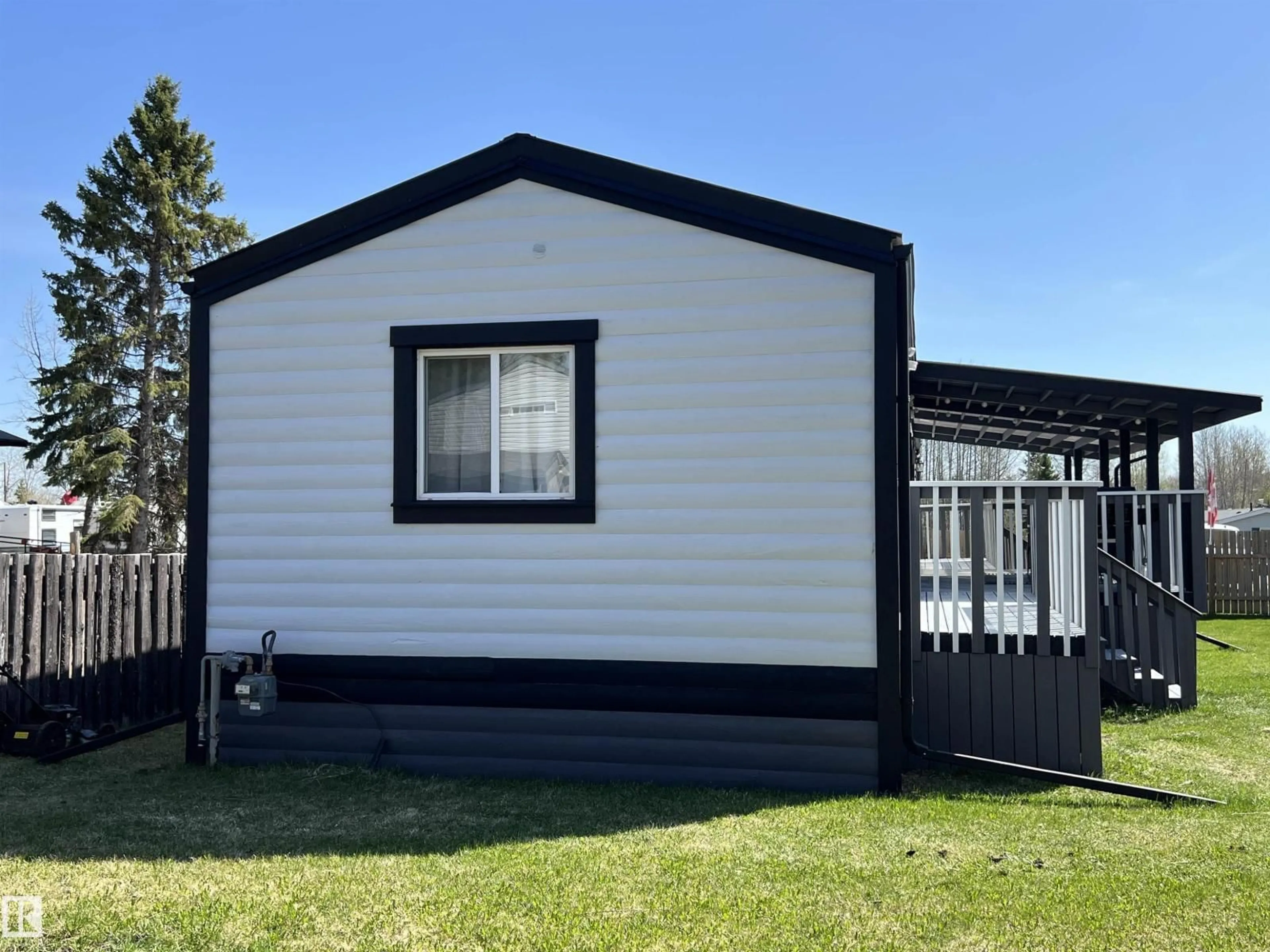 Home with vinyl exterior material, street for 4902 50 ST, Buck Creek Alberta T0C0S0